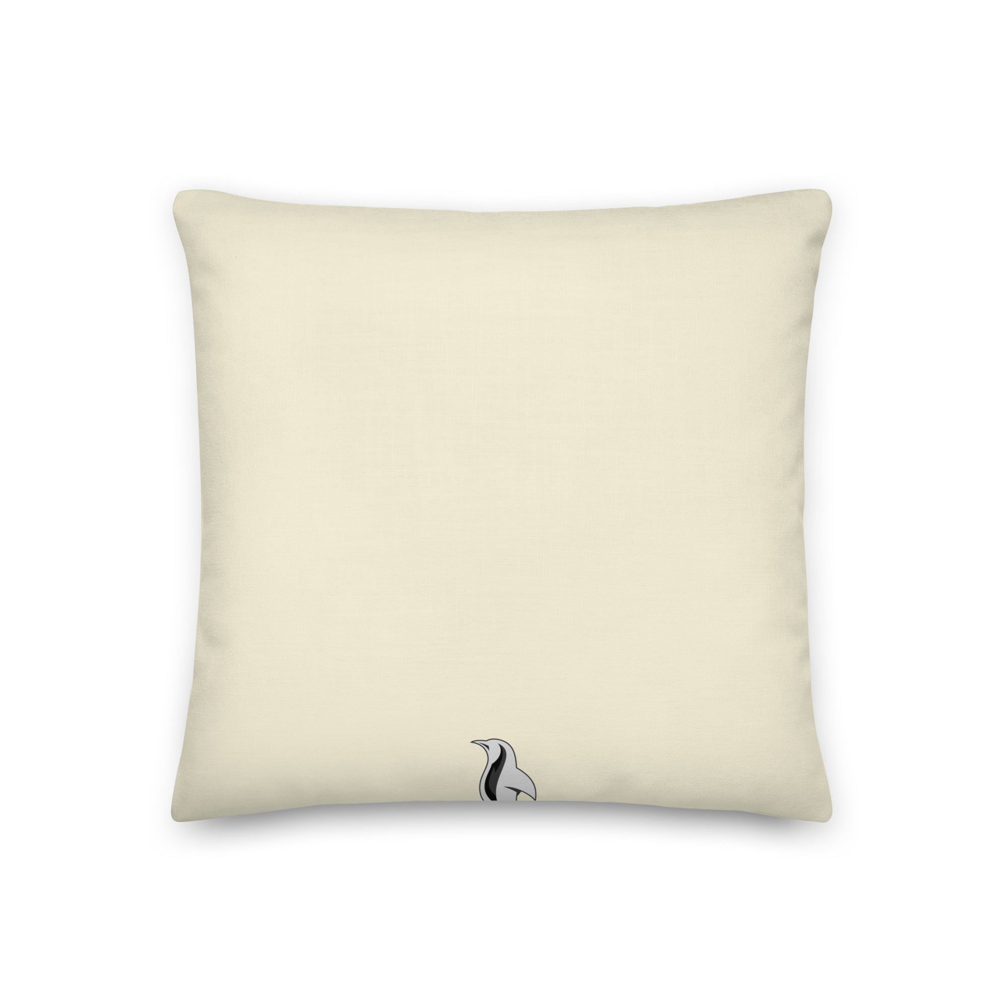 a white pillow with a black and white cat on it