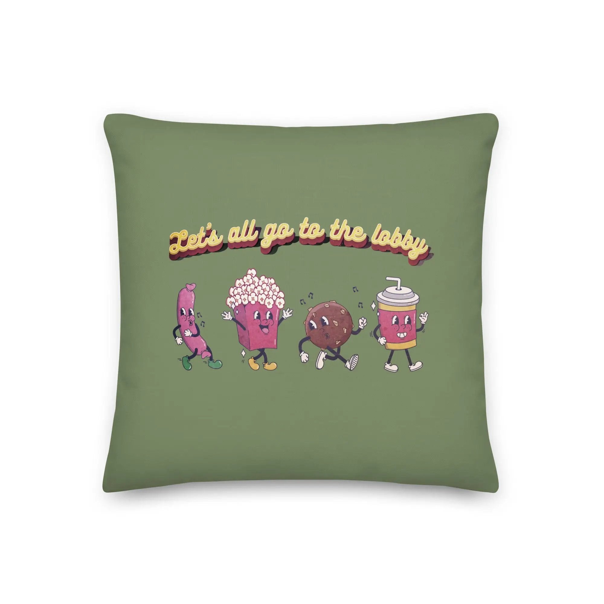 a green pillow with three cartoon characters on it