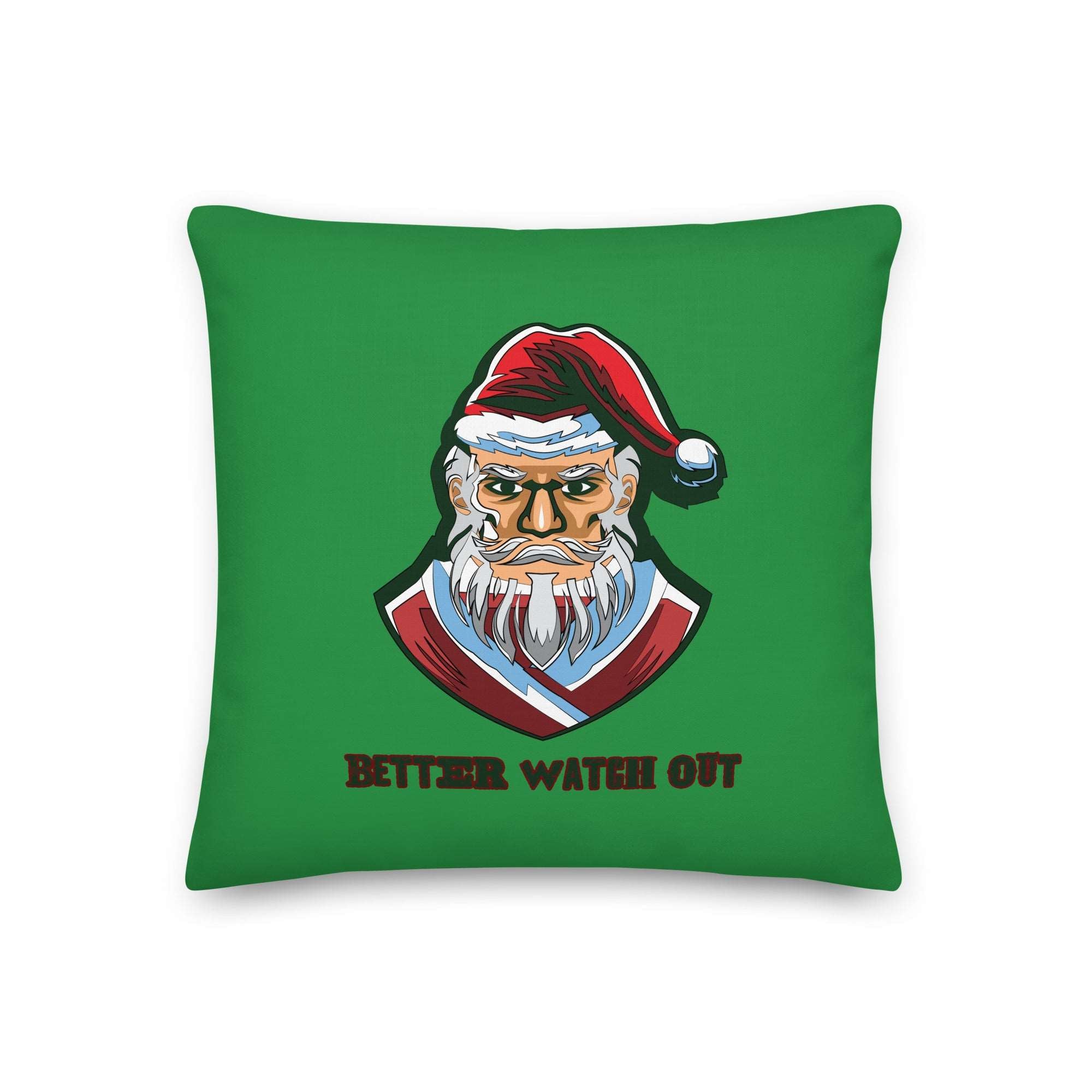 a green pillow with a santa clause on it