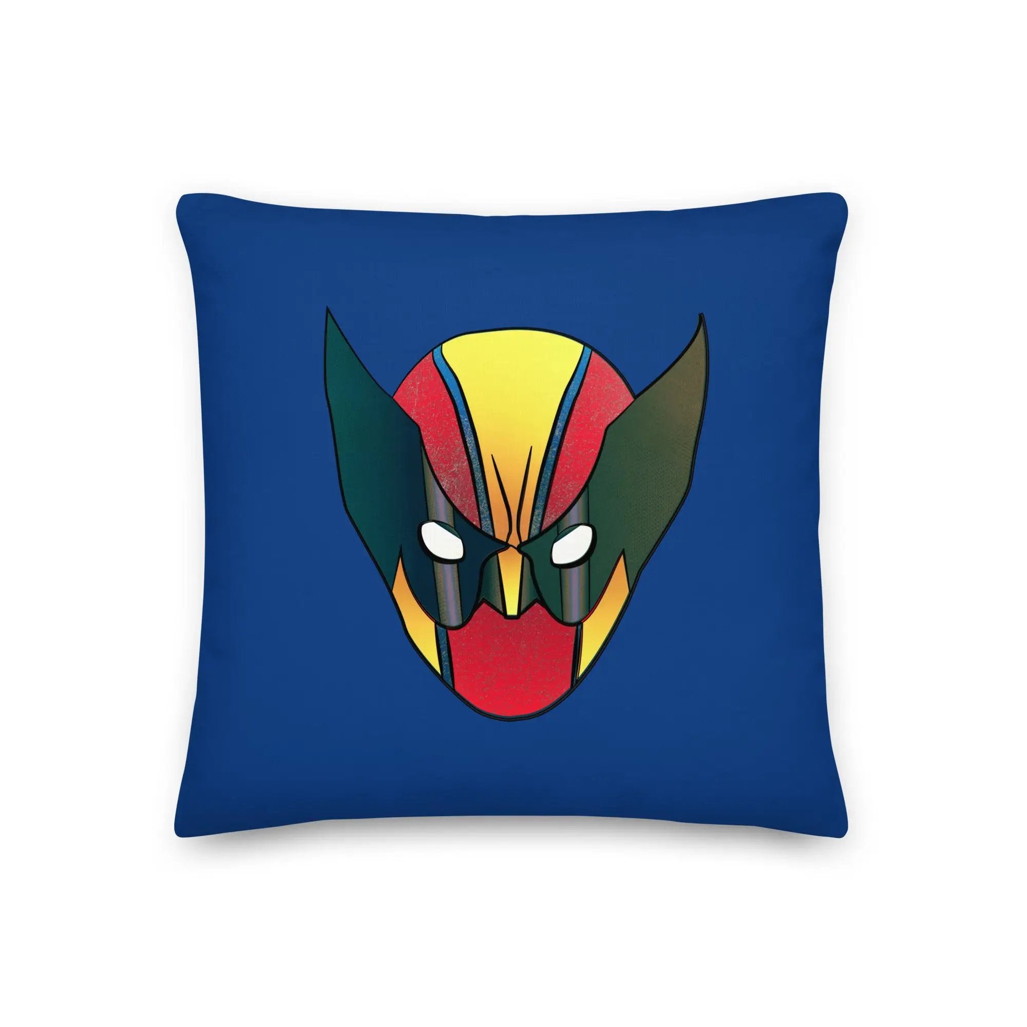 a blue pillow with a red and yellow mask on it