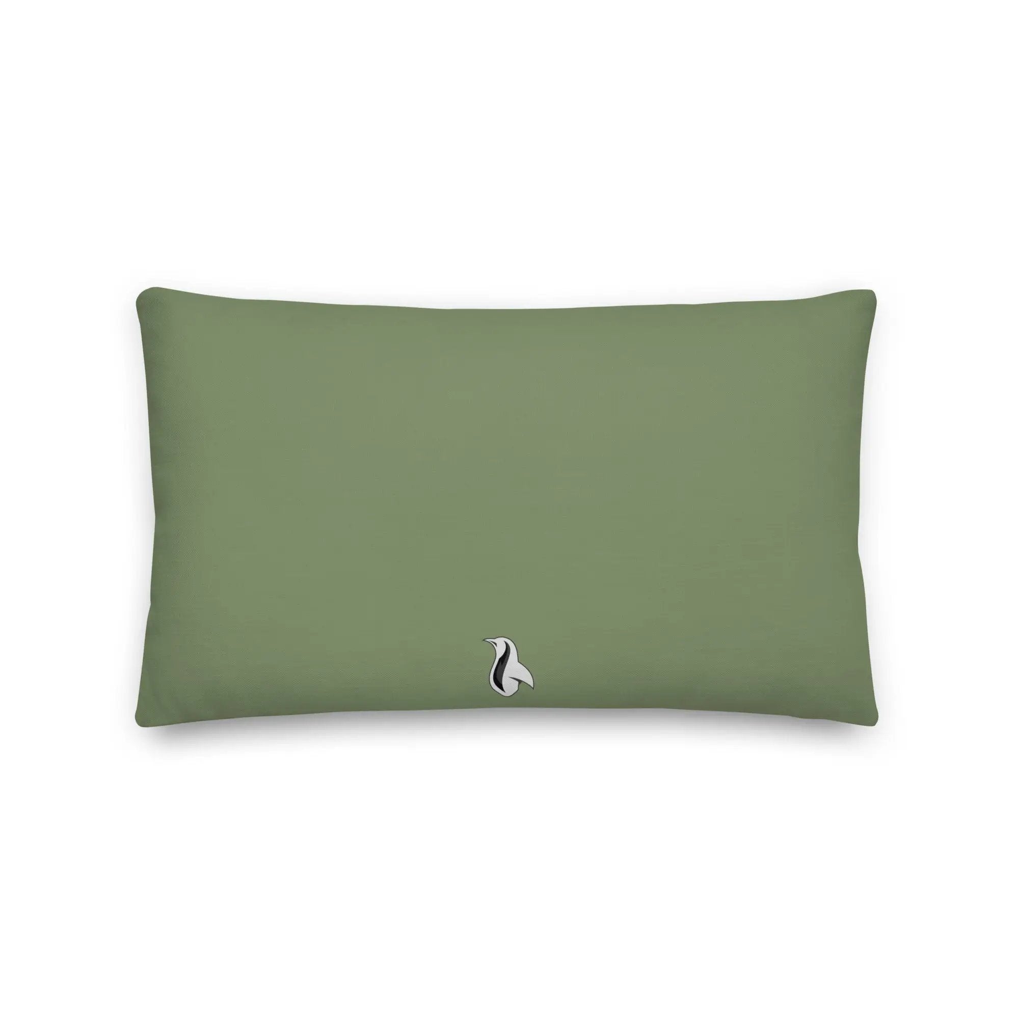 a green pillow with a white bird on it