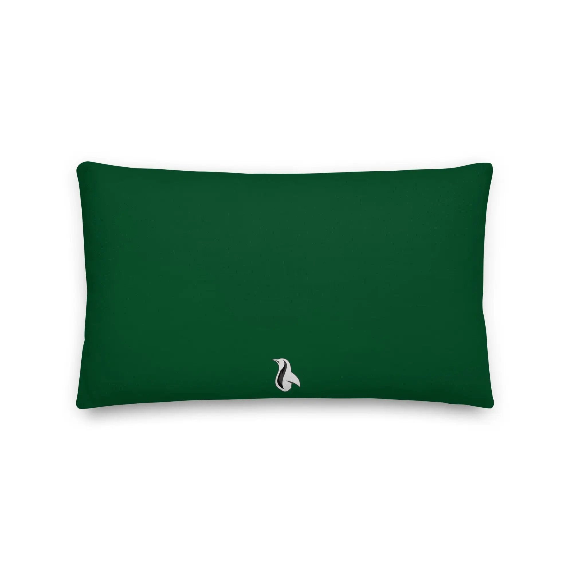 a green rectangular pillow with a white bird on it