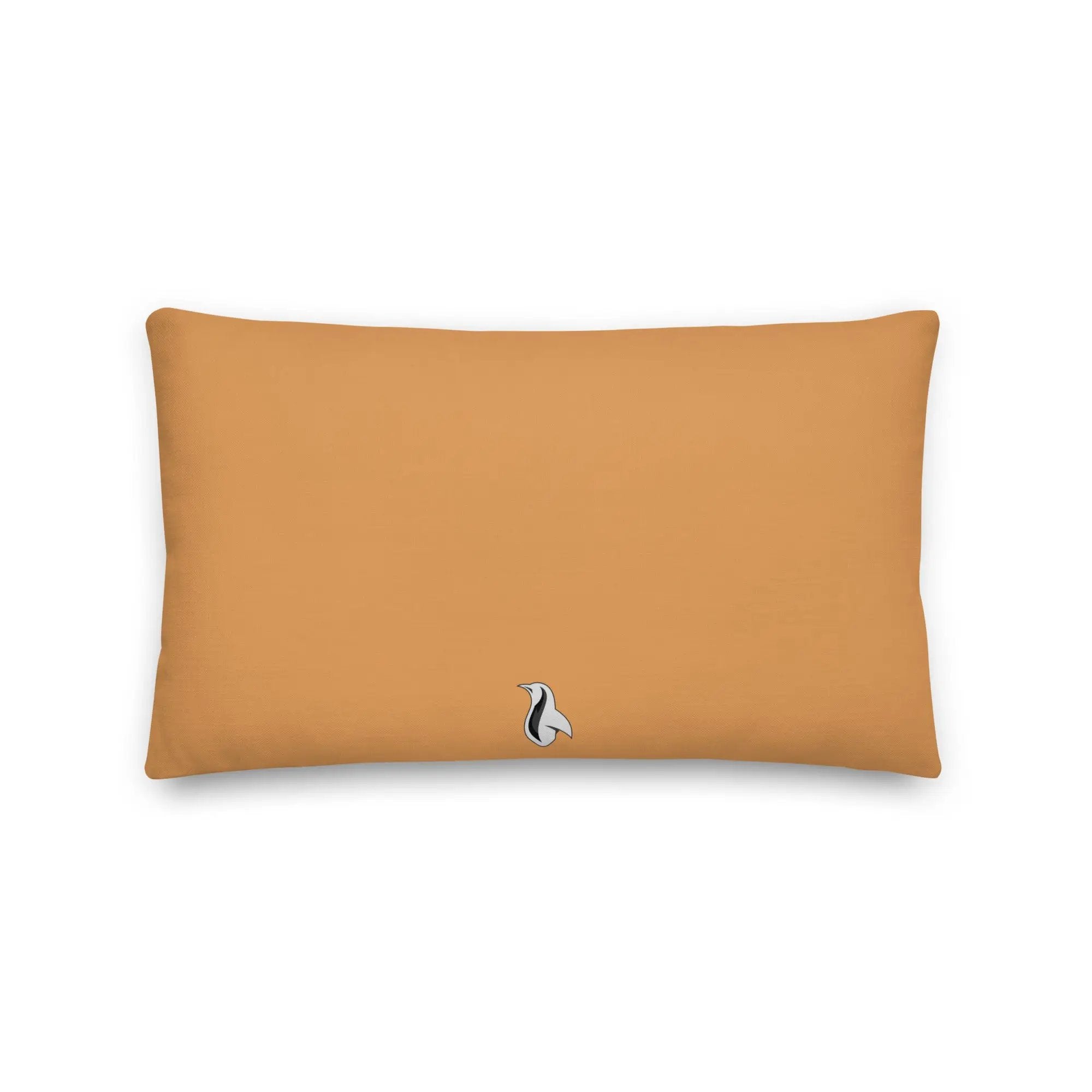 an orange pillow with a white cat on it
