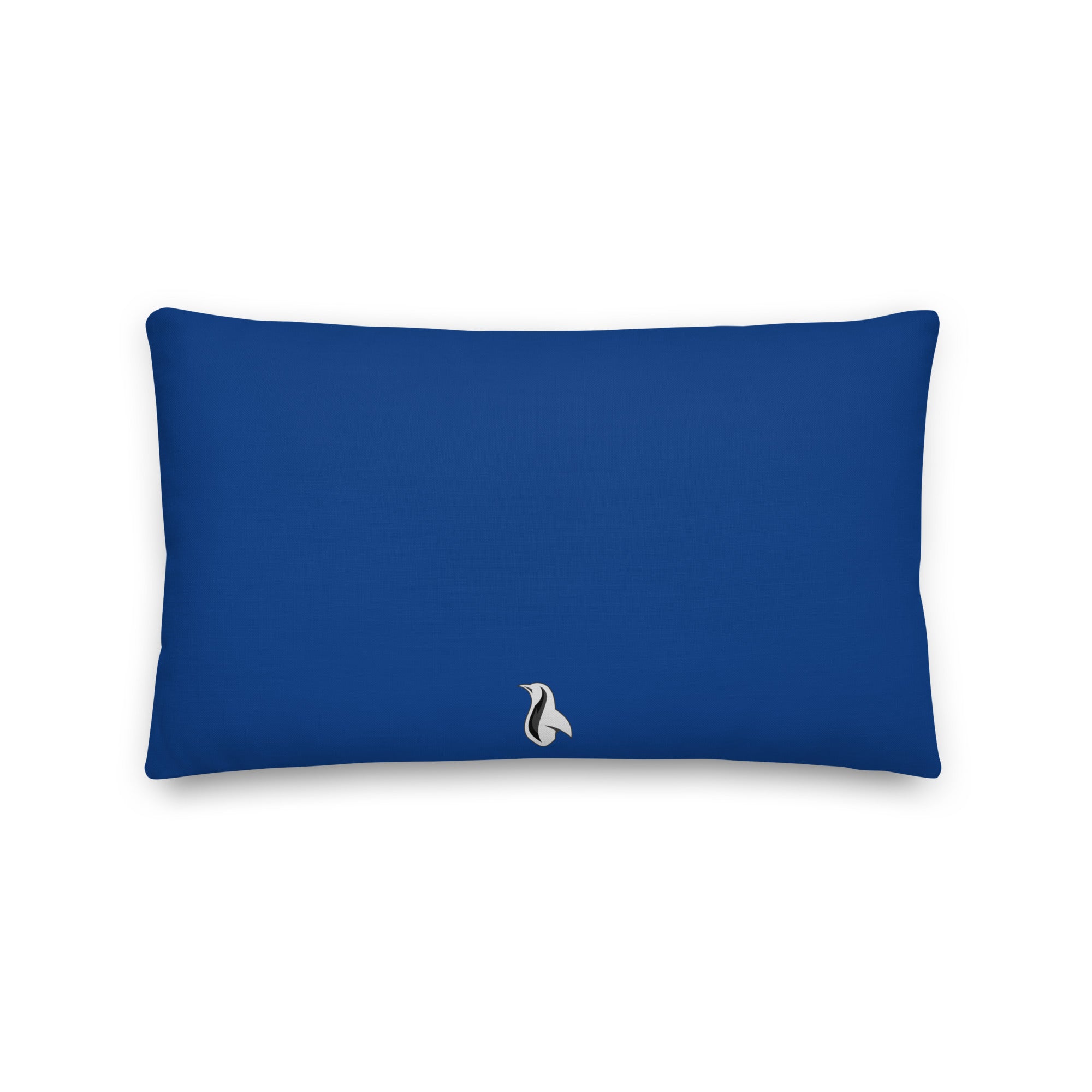a blue pillow with a white bird on it
