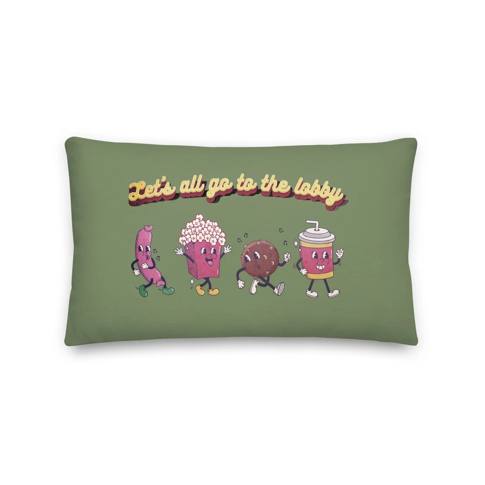 a green pillow with three cartoon characters on it