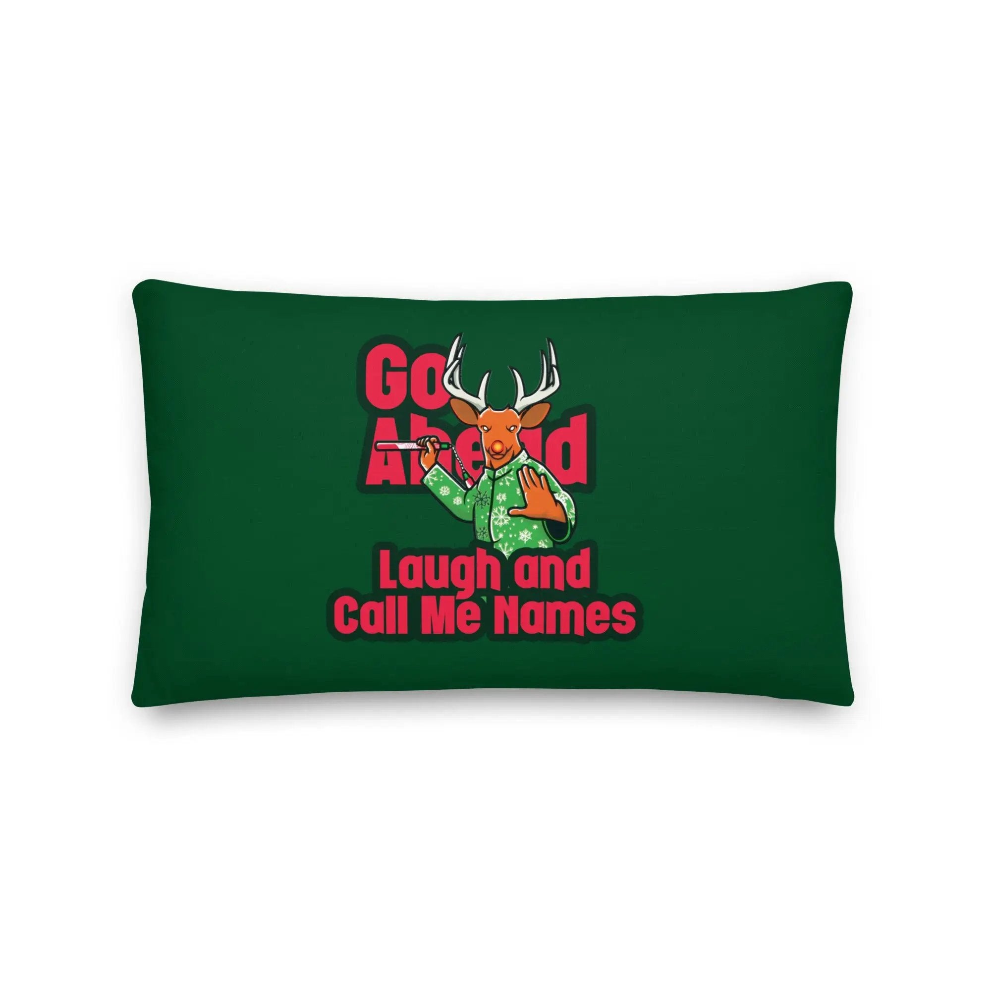 a green rectangular pillow with a picture of a deer on it