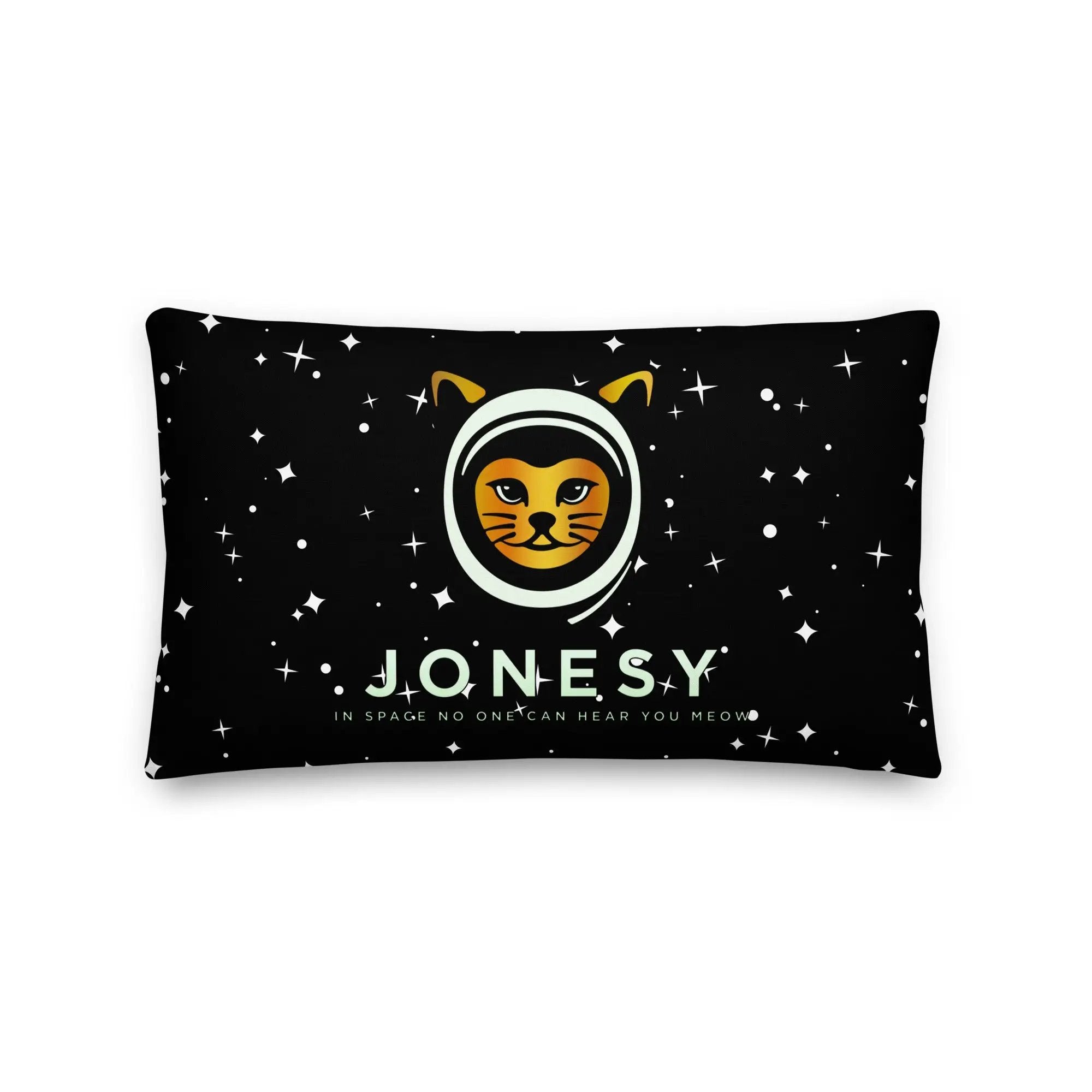a black pillow with a yellow and white cat on it