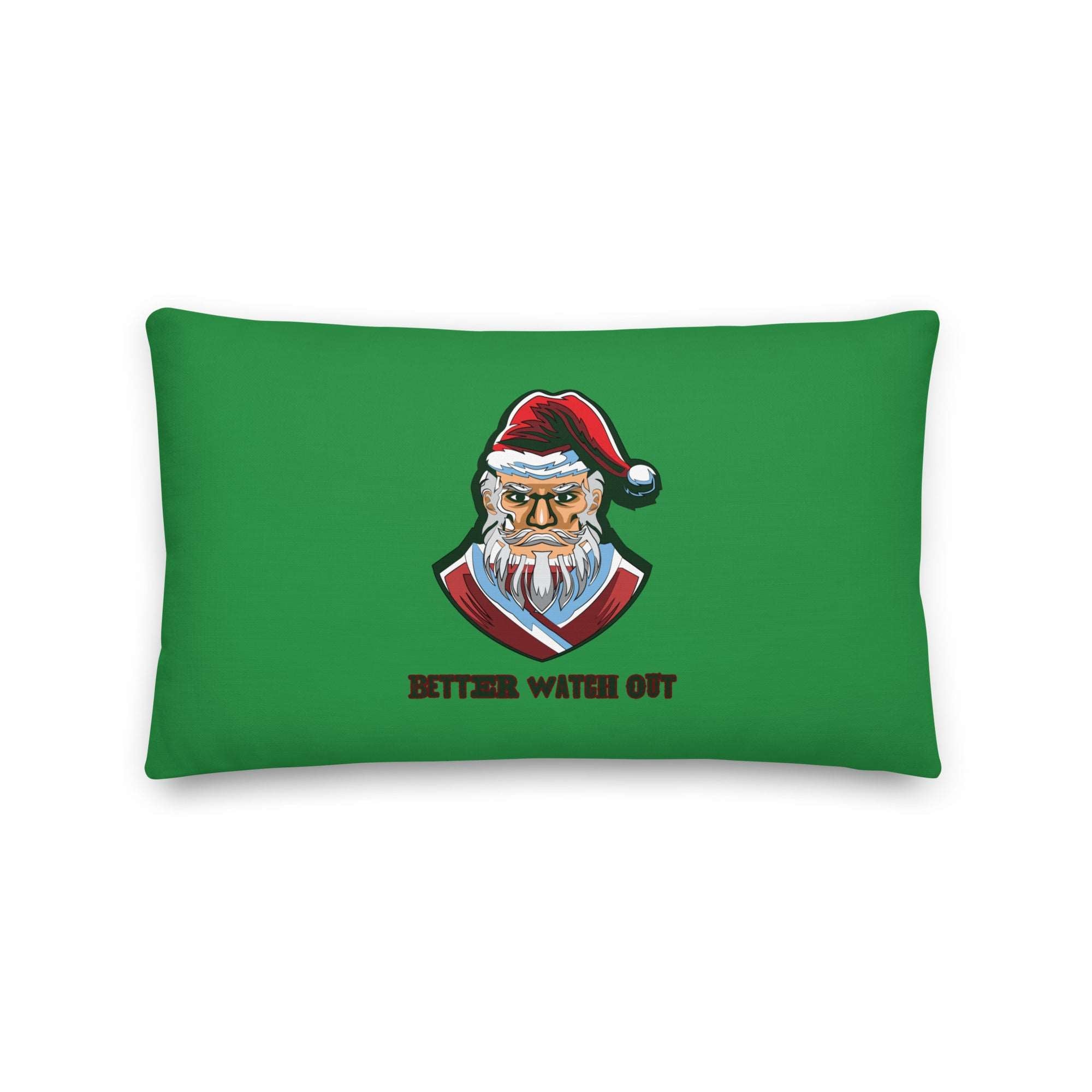 a green pillow with a santa clause on it
