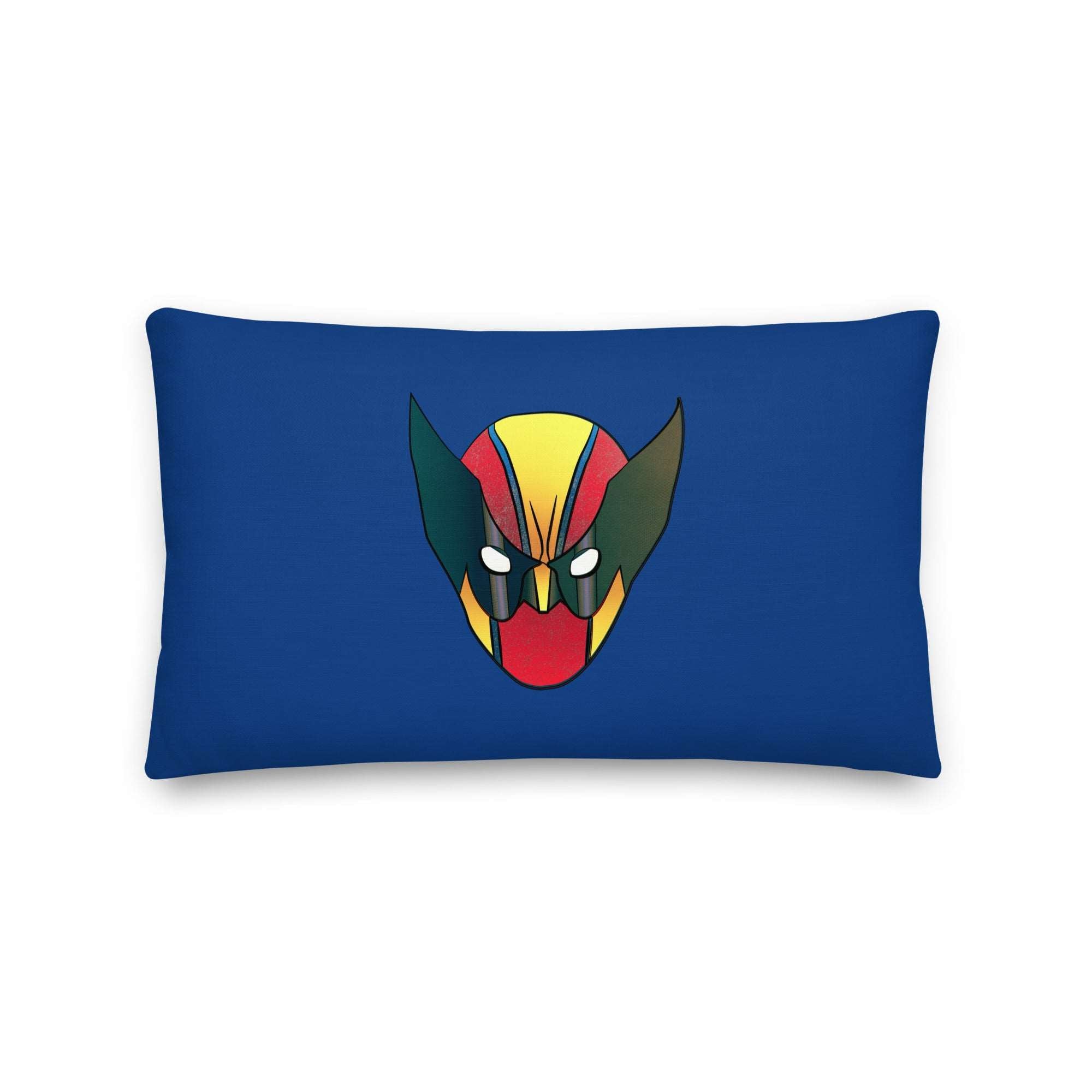 a blue rectangular pillow with a stylized image of a demon's head