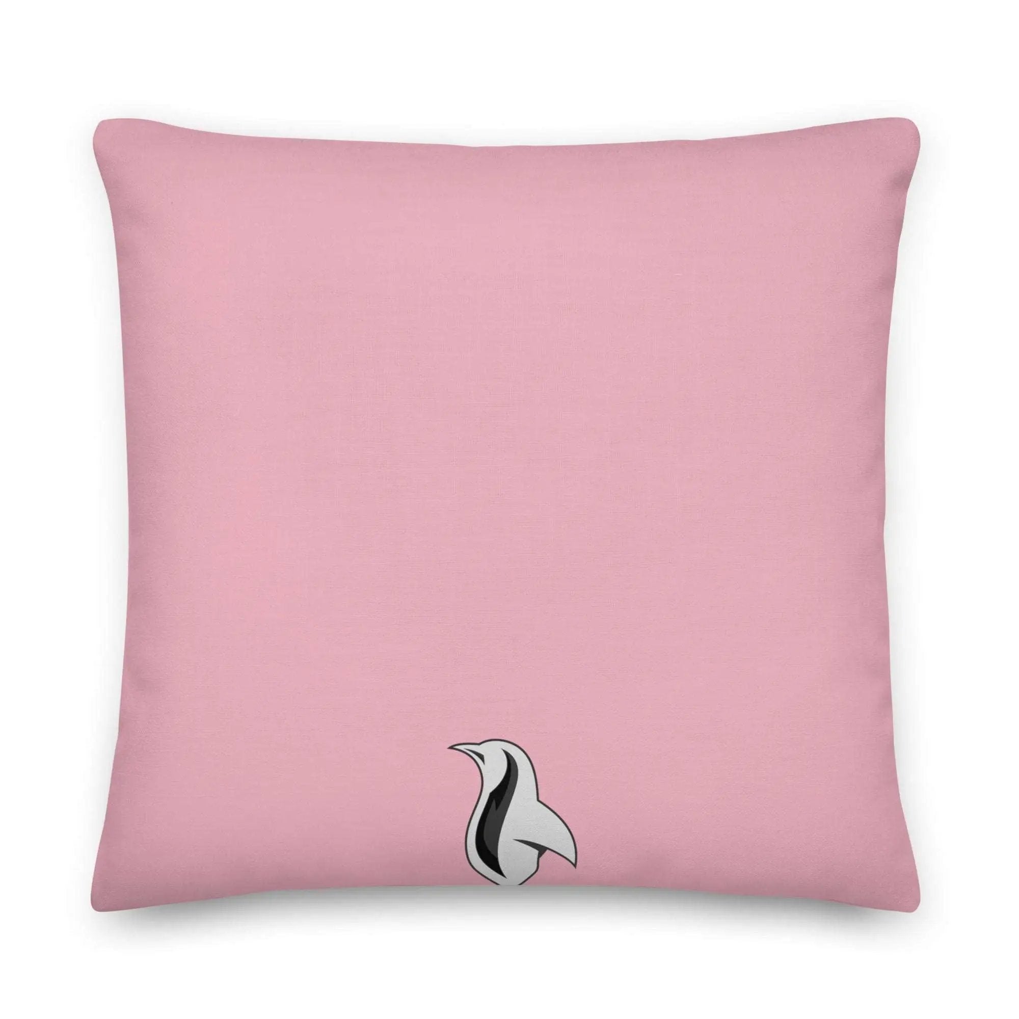 a pink pillow with a black and white bird on it