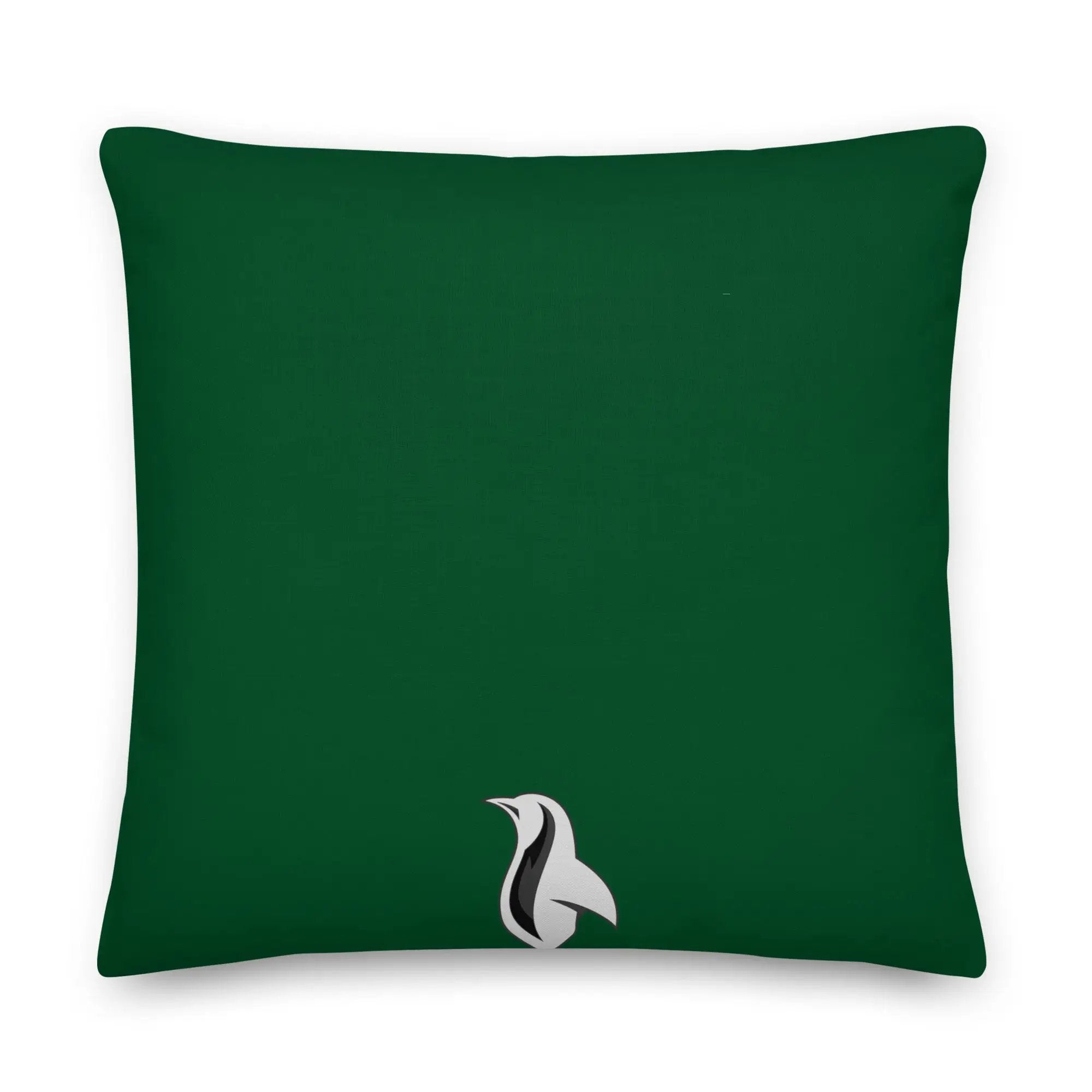 a green pillow with a white bird on it