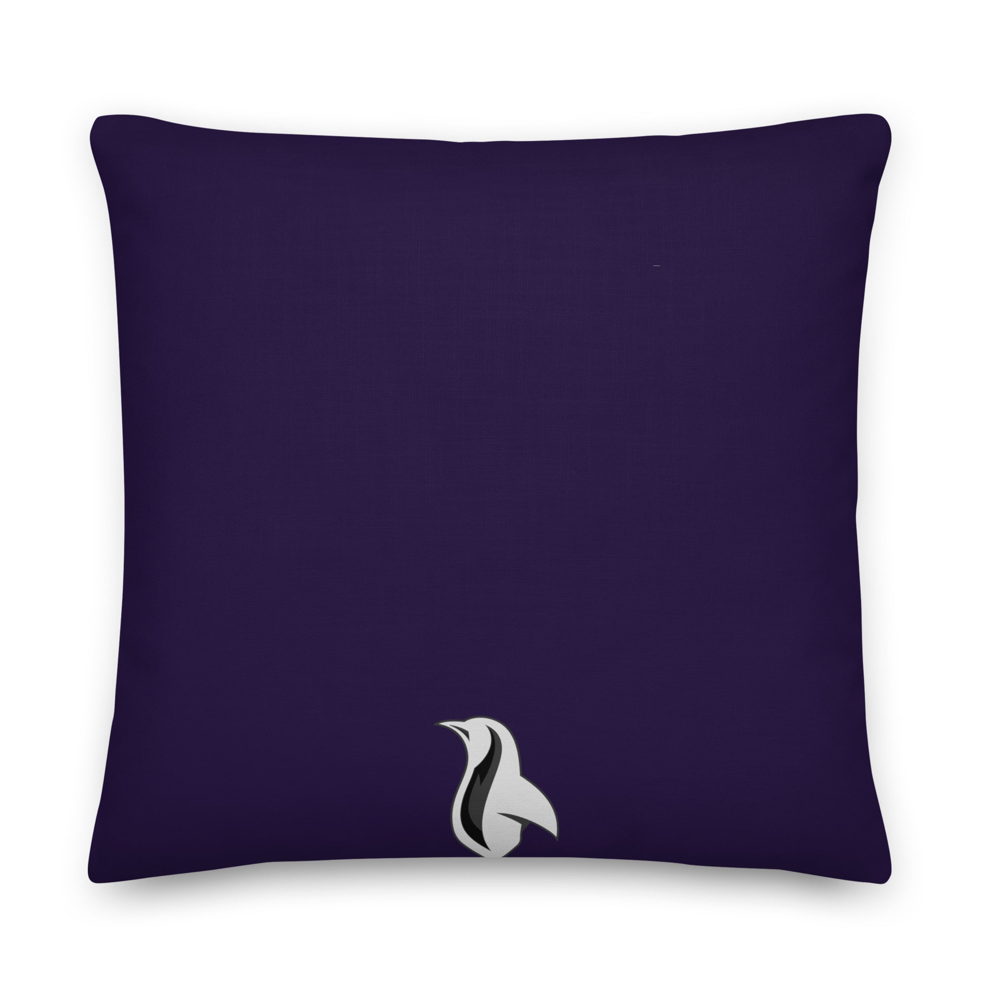 a purple pillow with a white bird on it