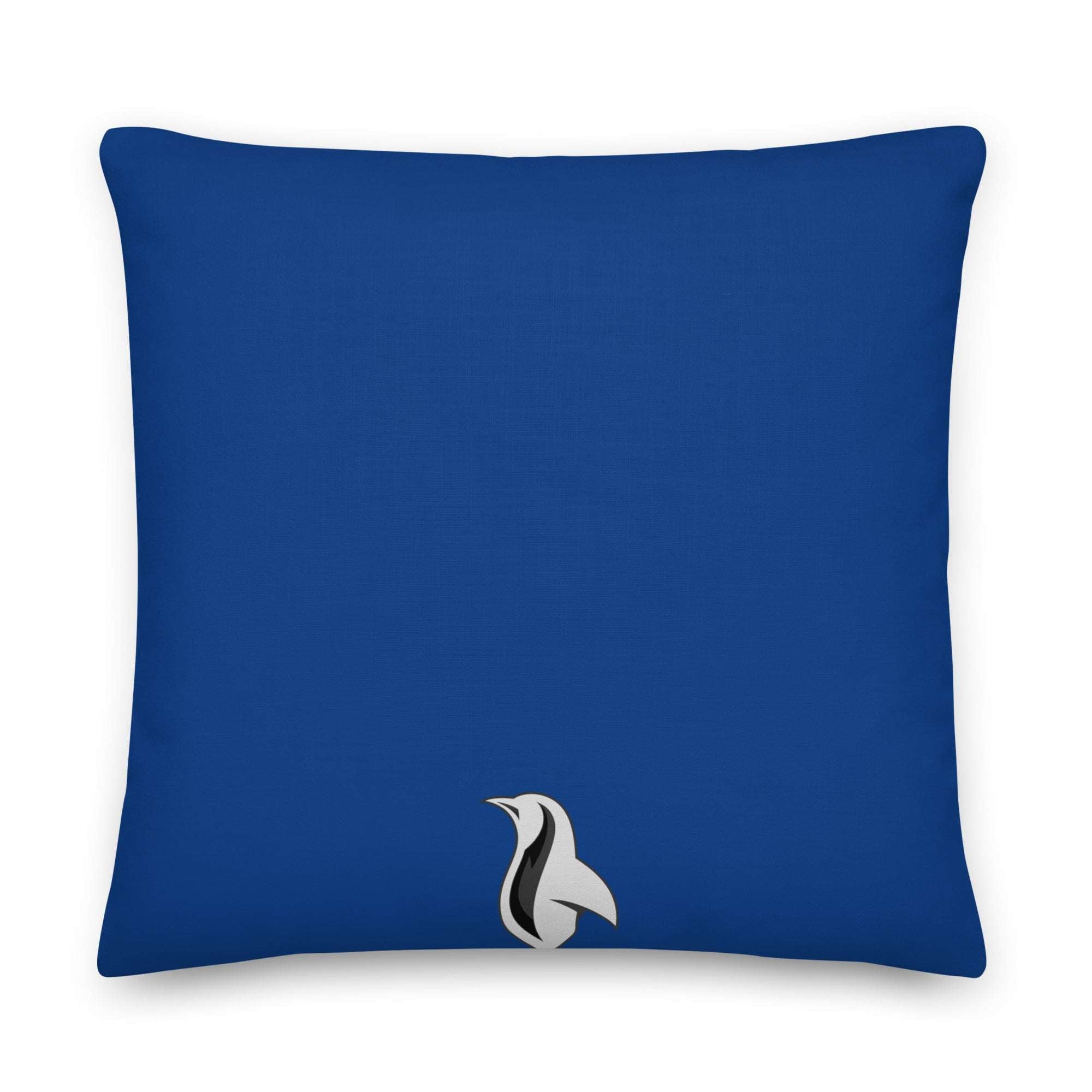 a blue pillow with a black and white bird on it
