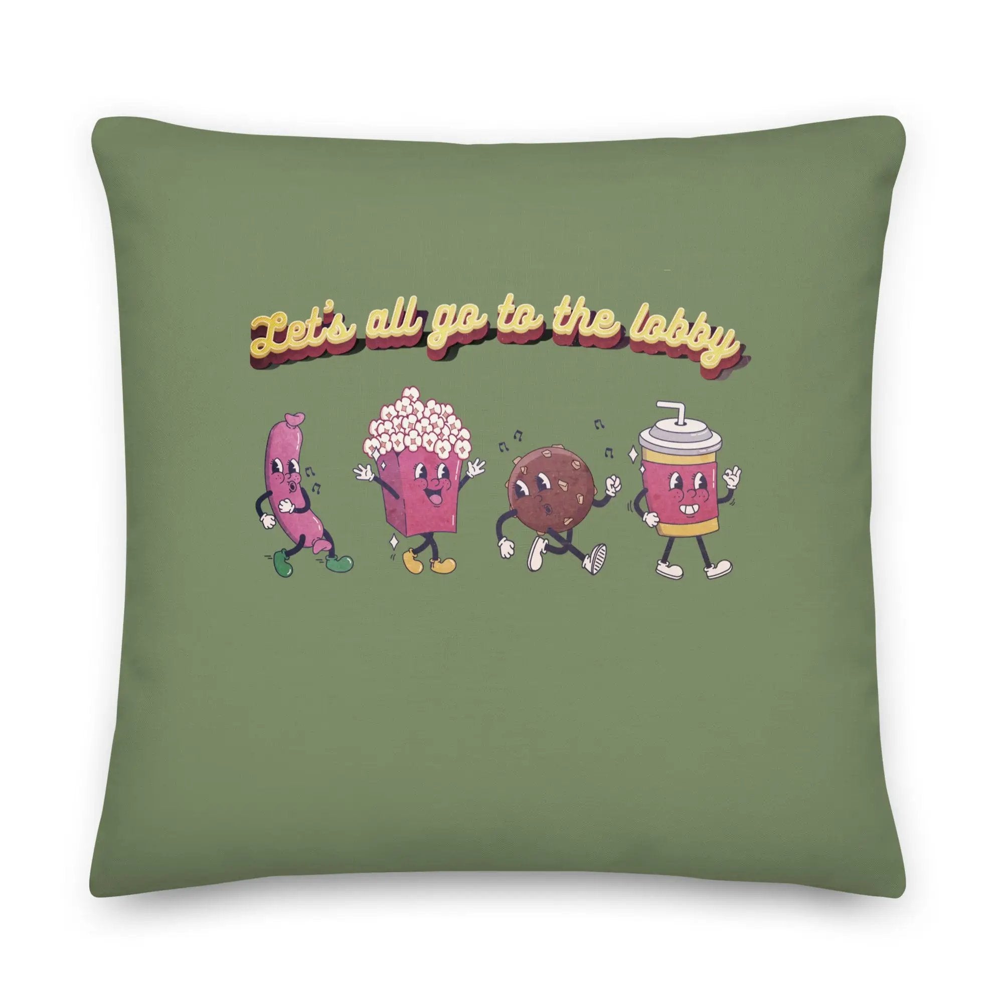 a green pillow with three cartoon characters on it