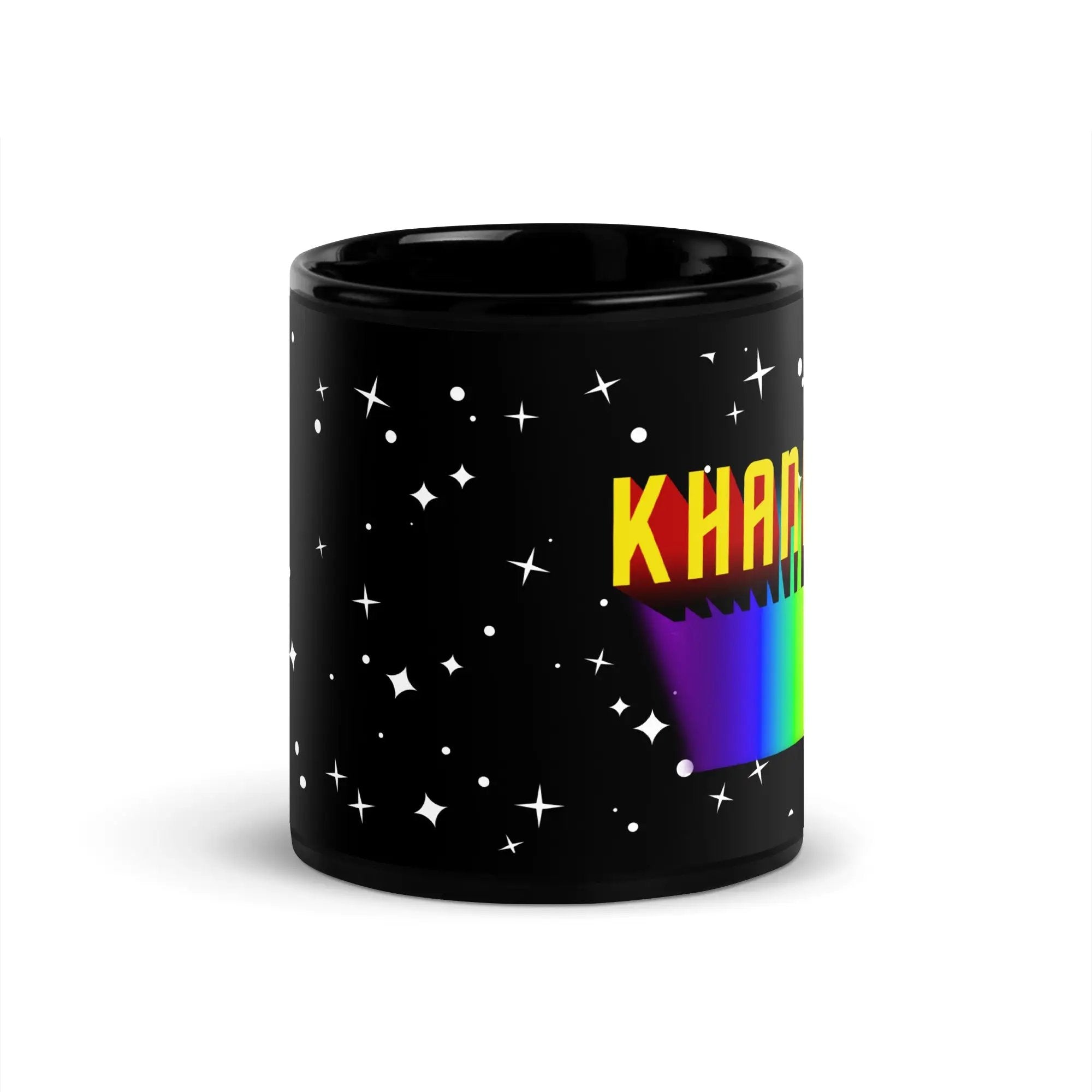 a black coffee mug with a rainbow and stars on it