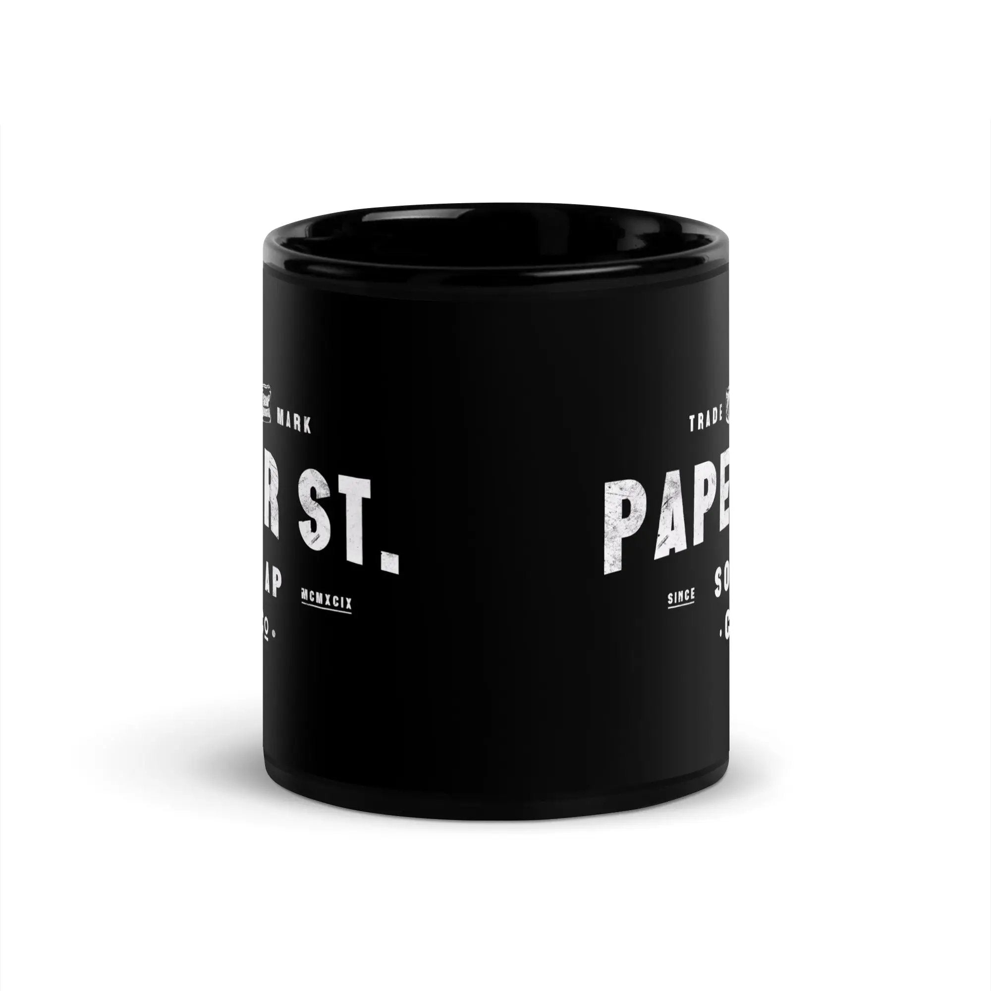 a black coffee mug with the words paper on it
