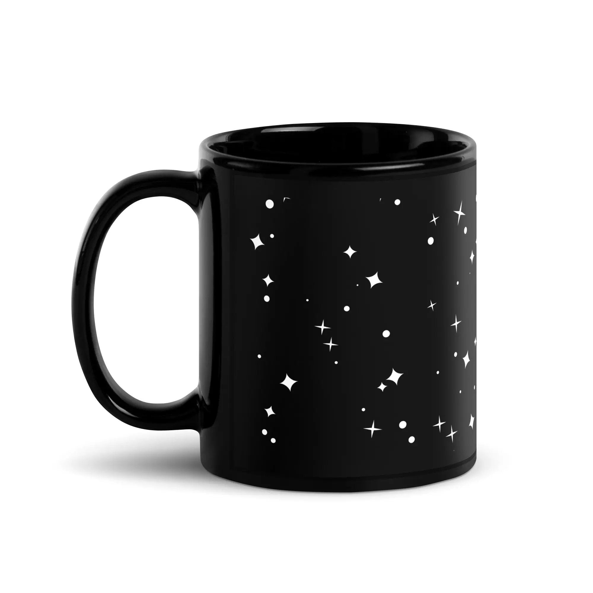 a black coffee mug with white stars on it
