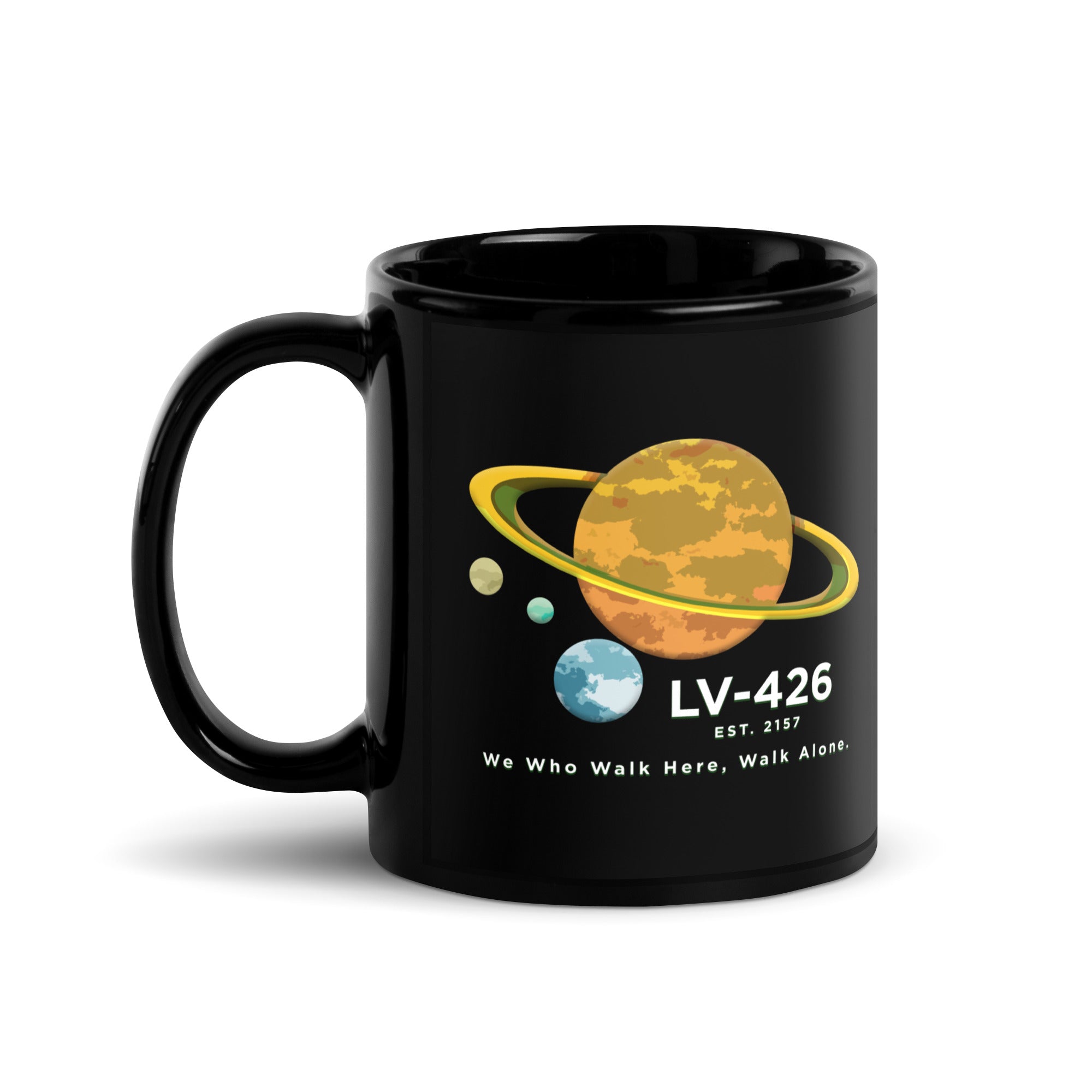 a black mug with a picture of the planets on it