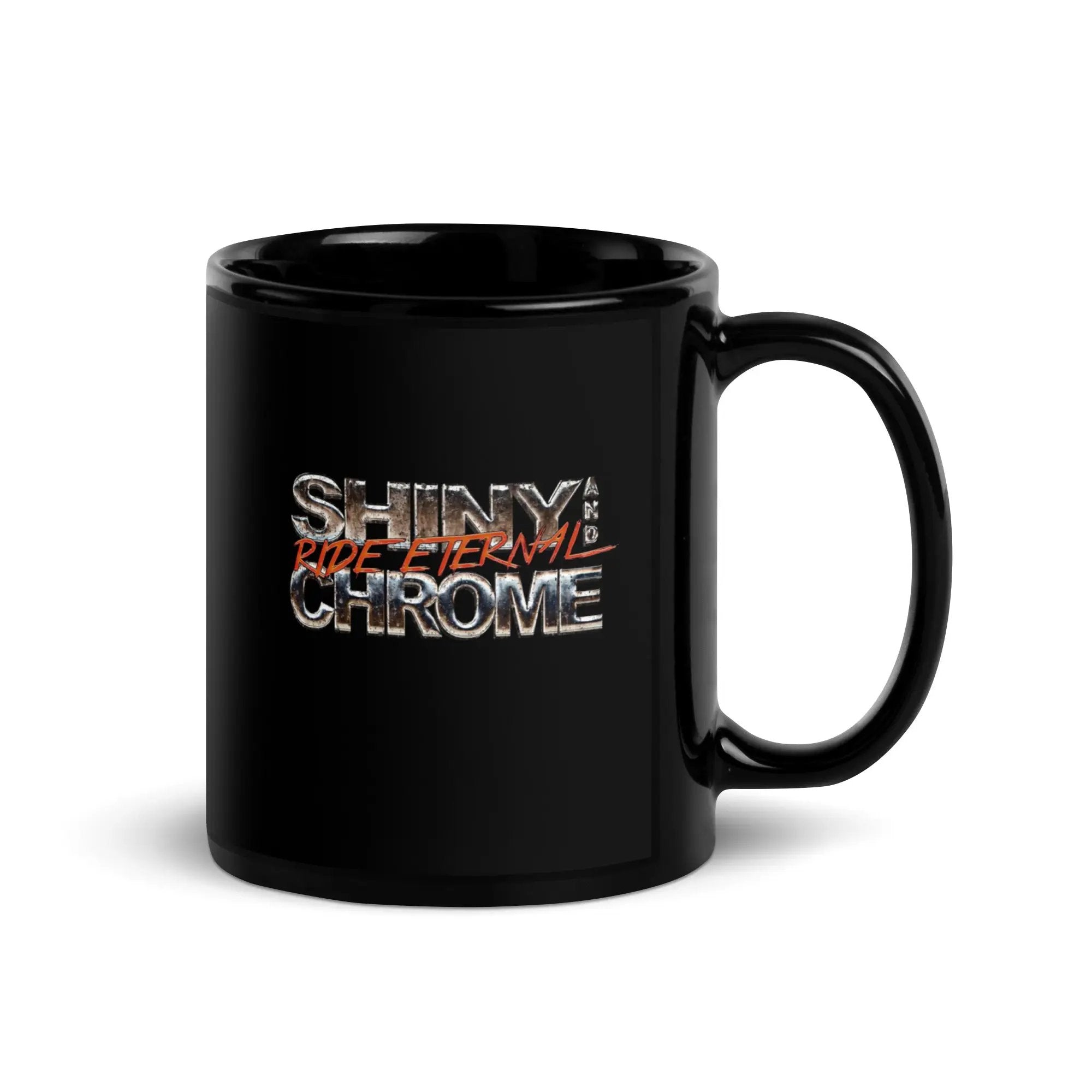 a black coffee mug with shiny chrome lettering