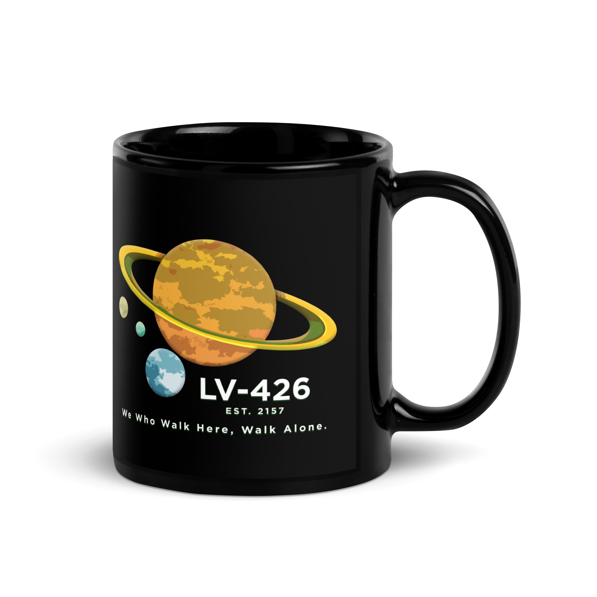 a black mug with a picture of the planets on it