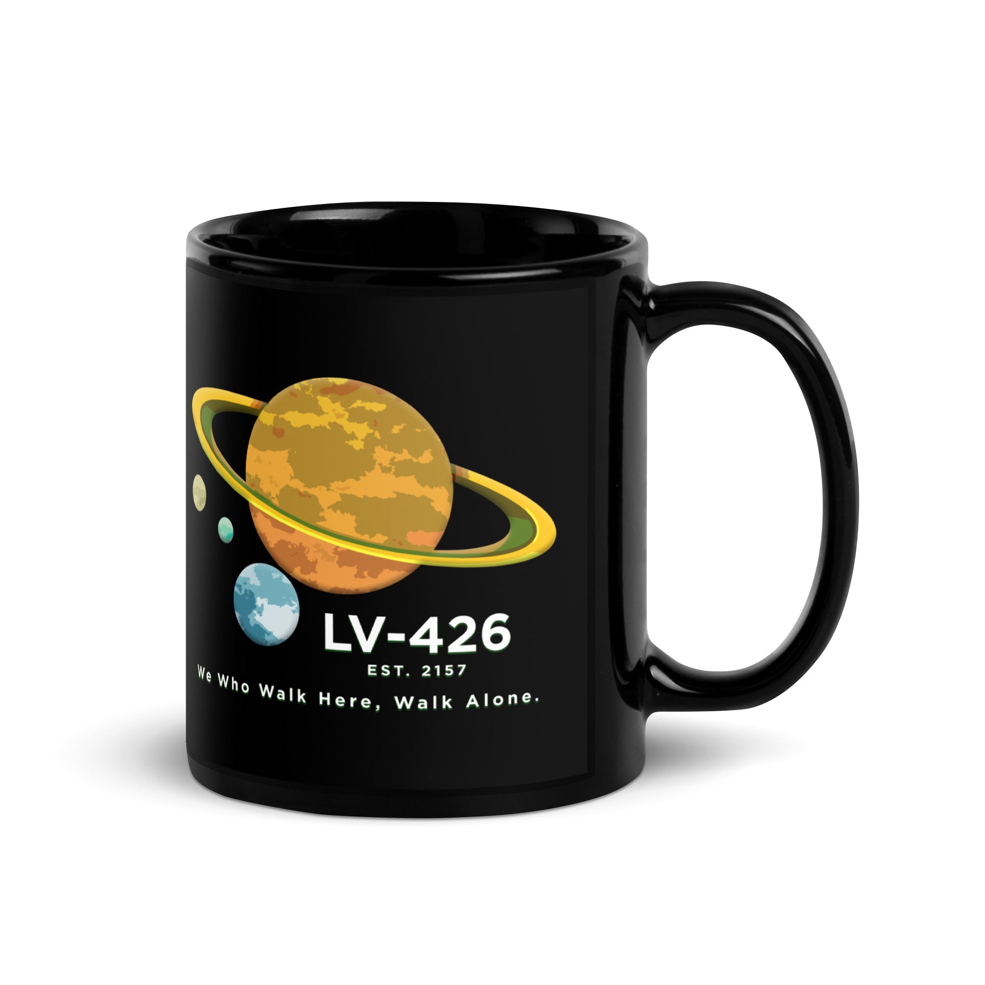 a black mug with a picture of the planets on it