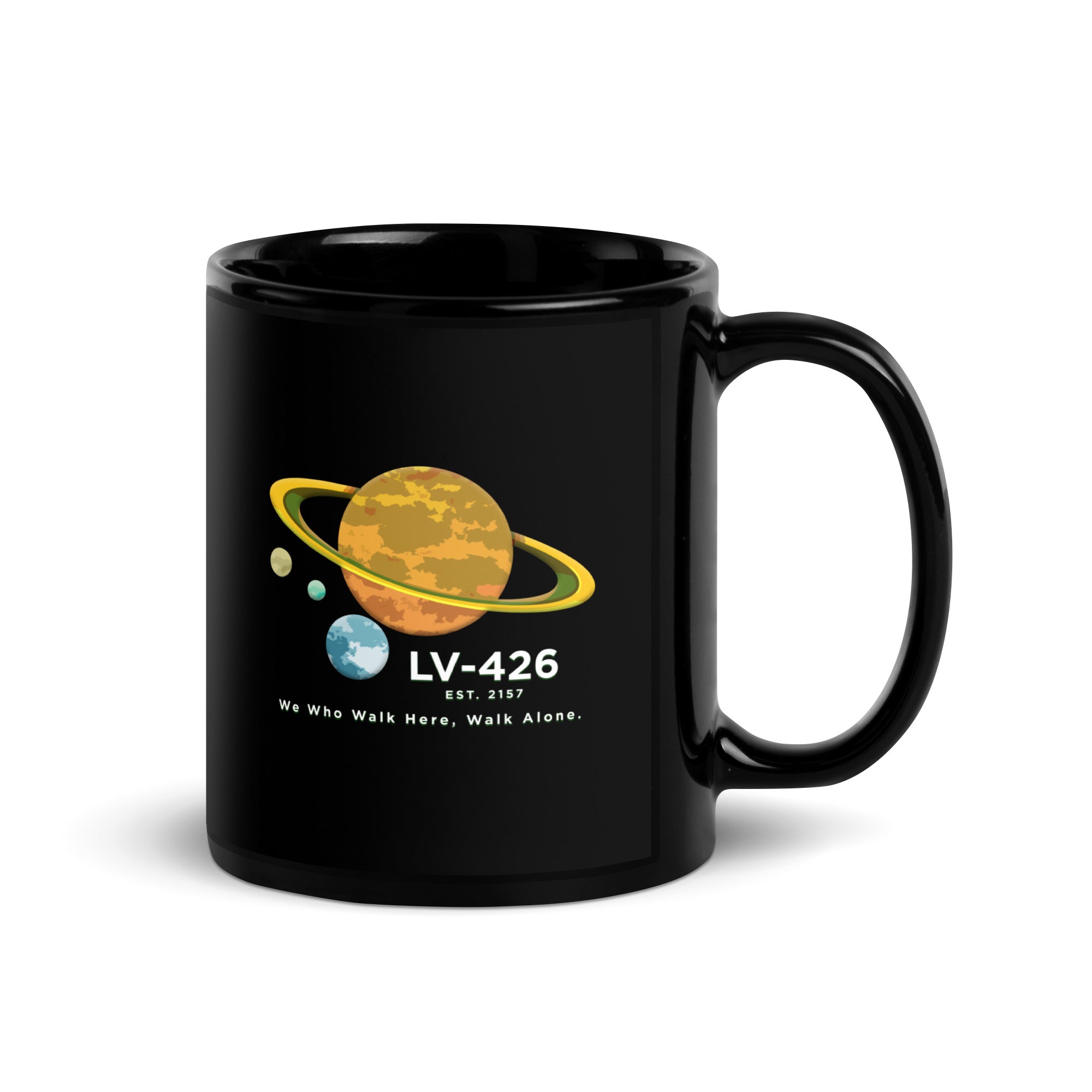 a black mug with a picture of the planets on it