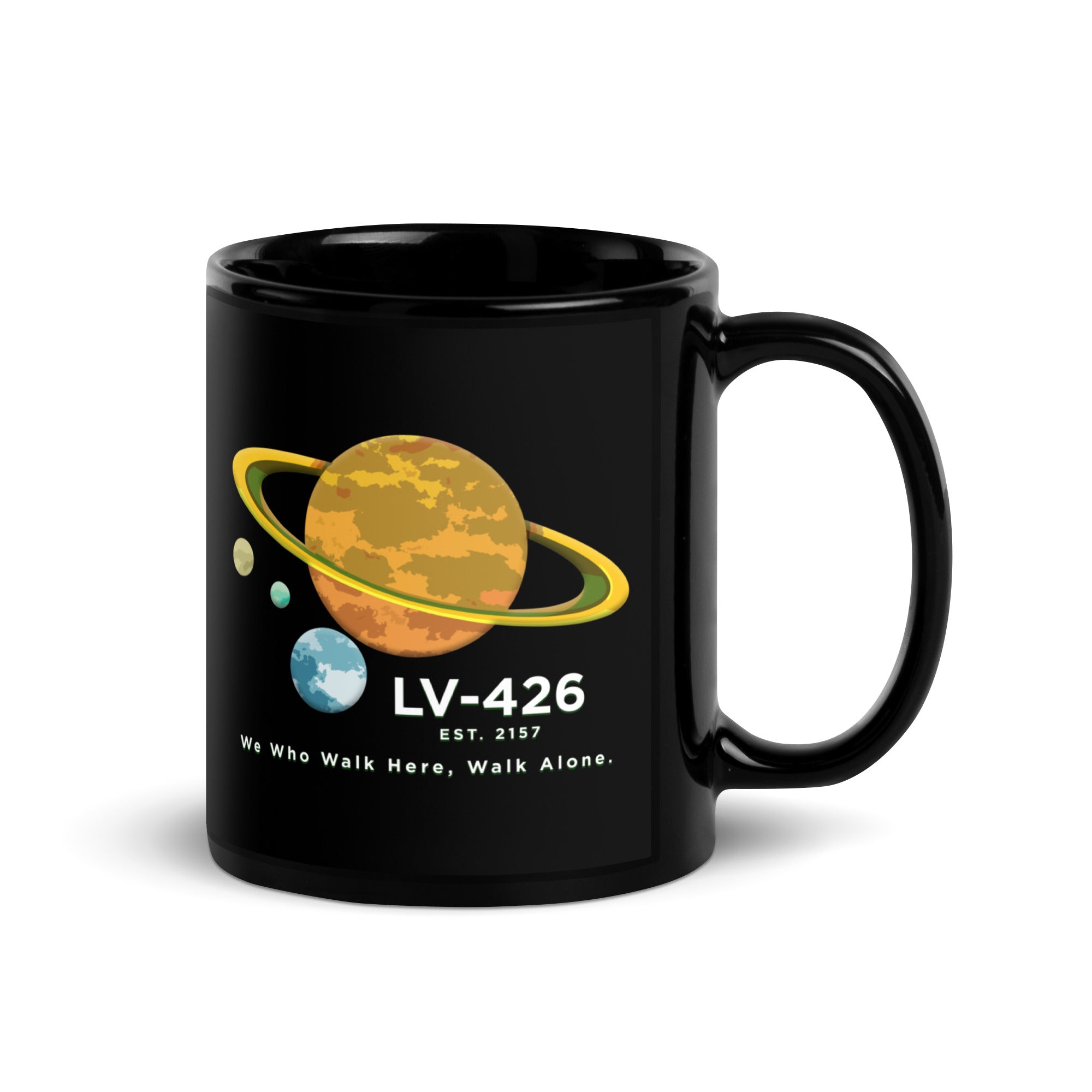 a black coffee mug with a picture of the planets on it