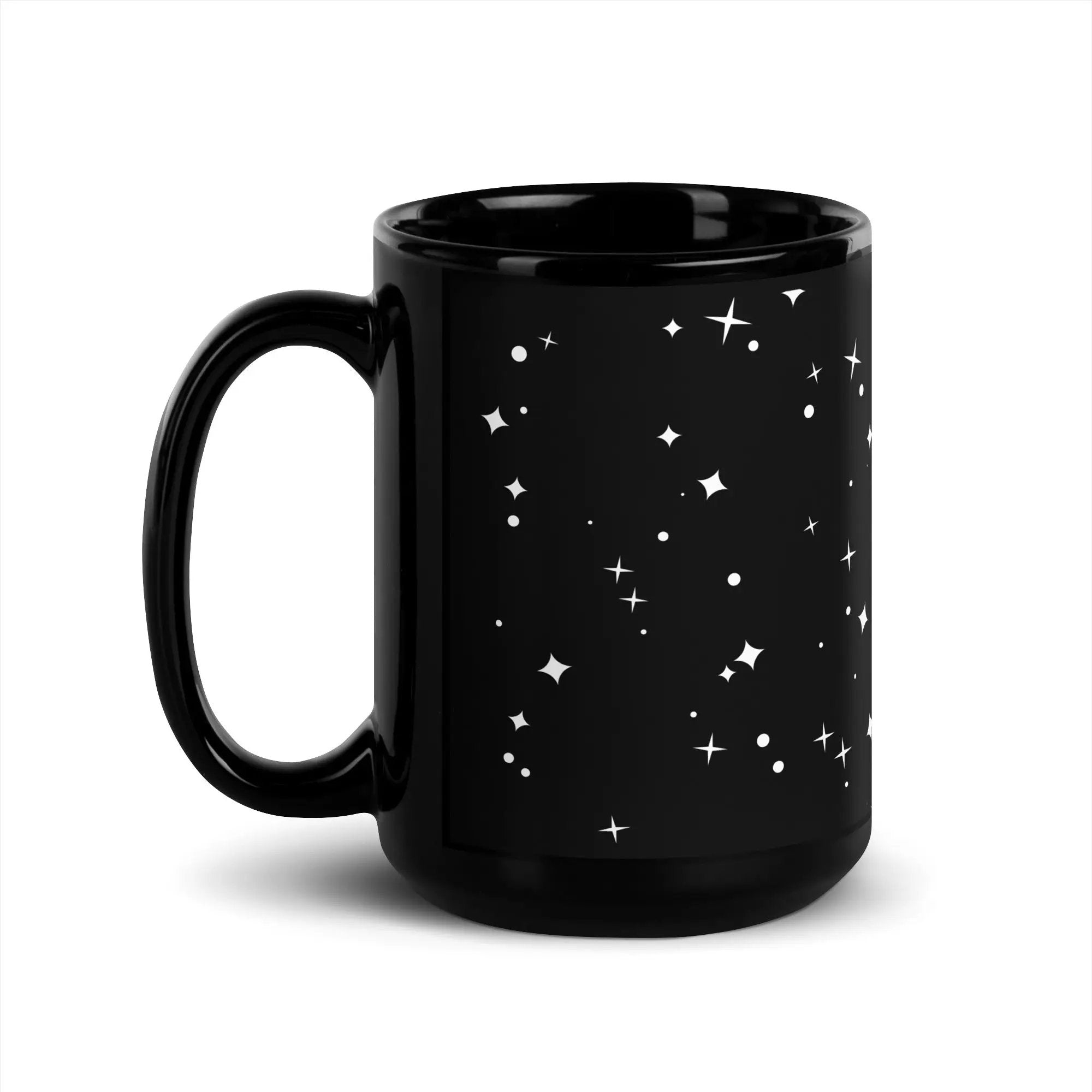 a black coffee mug with white stars on it