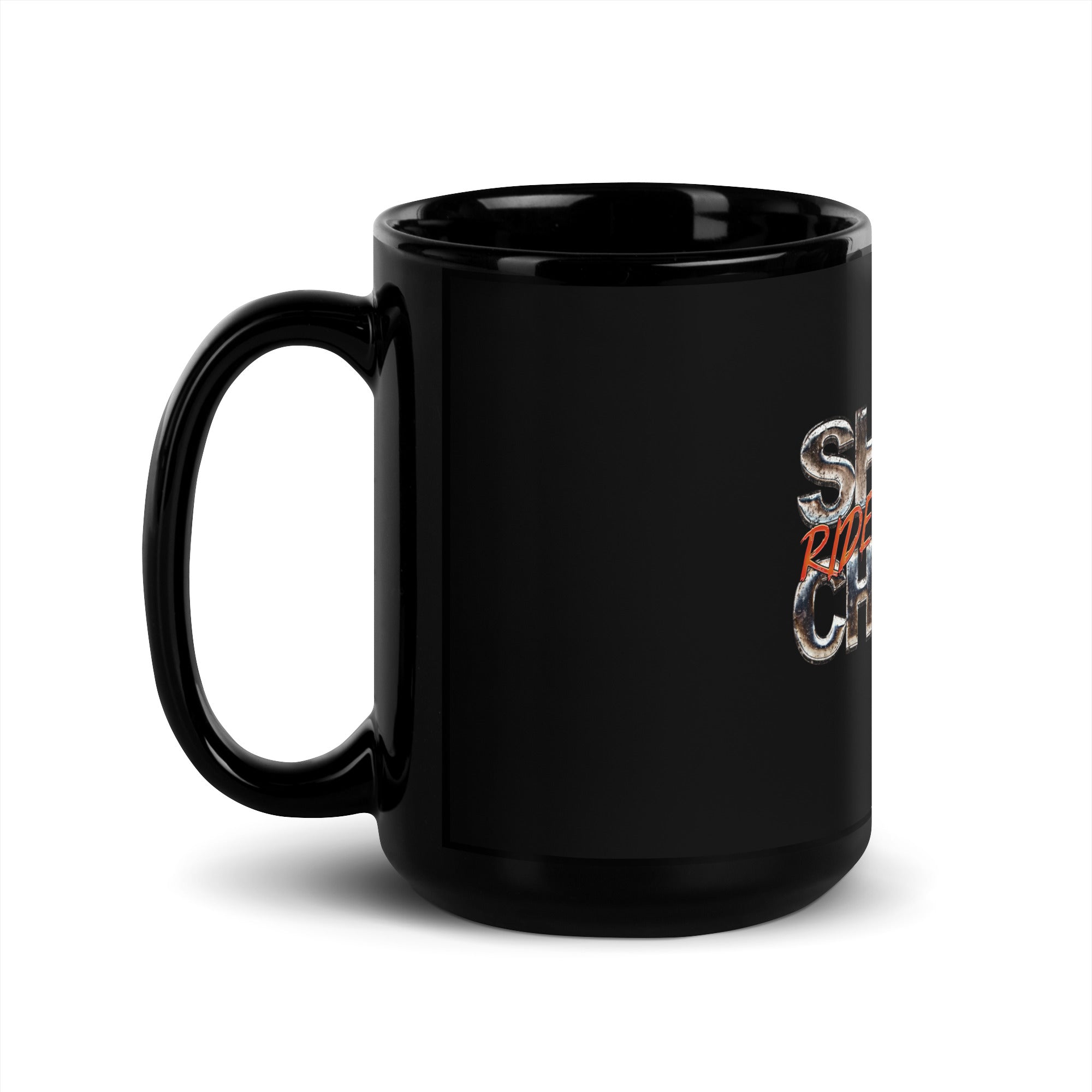 a black coffee mug with a snake on it