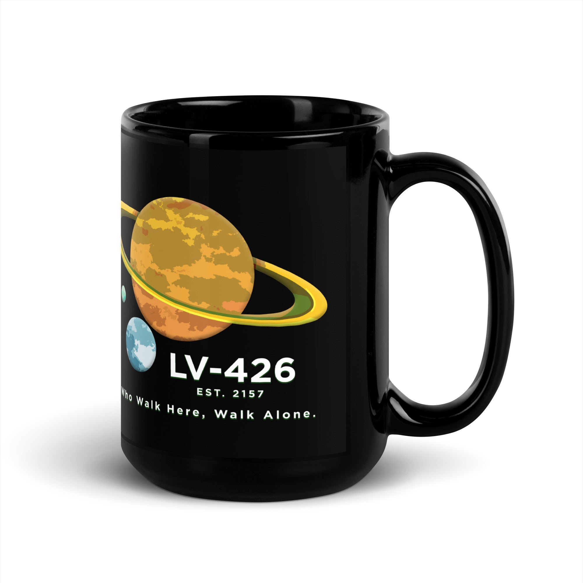 a black coffee mug with a picture of the planets