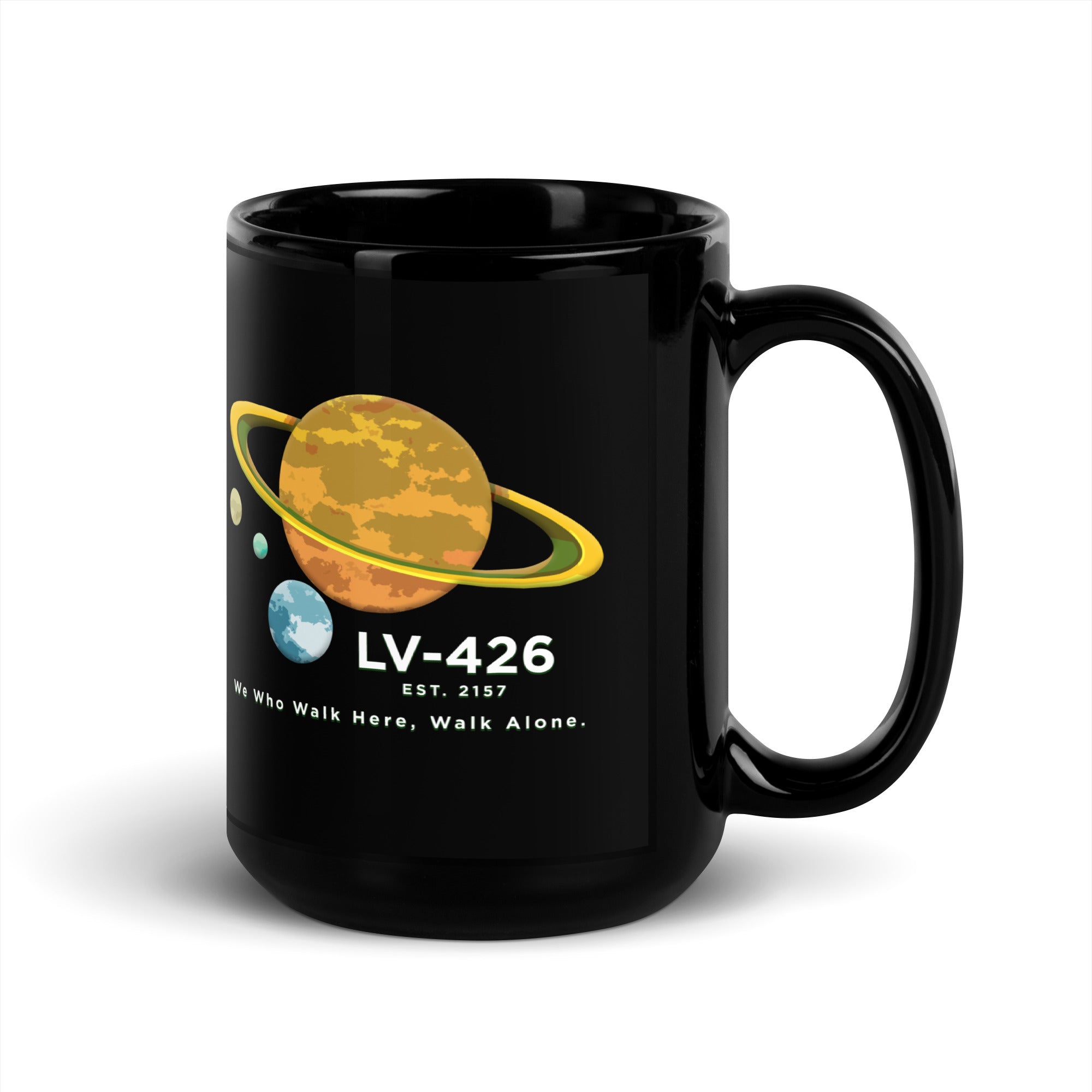 a black coffee mug with a picture of the planets