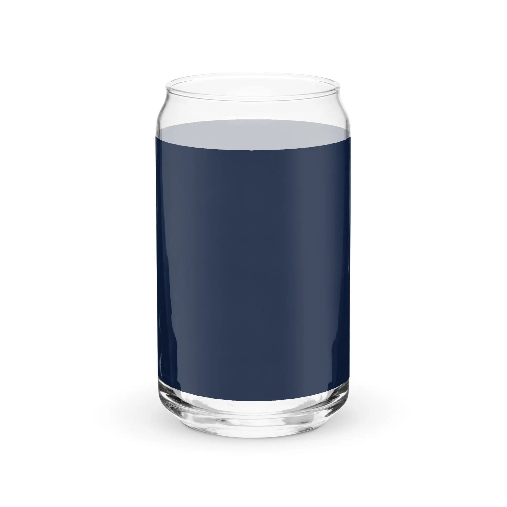 a glass filled with blue liquid on a white background