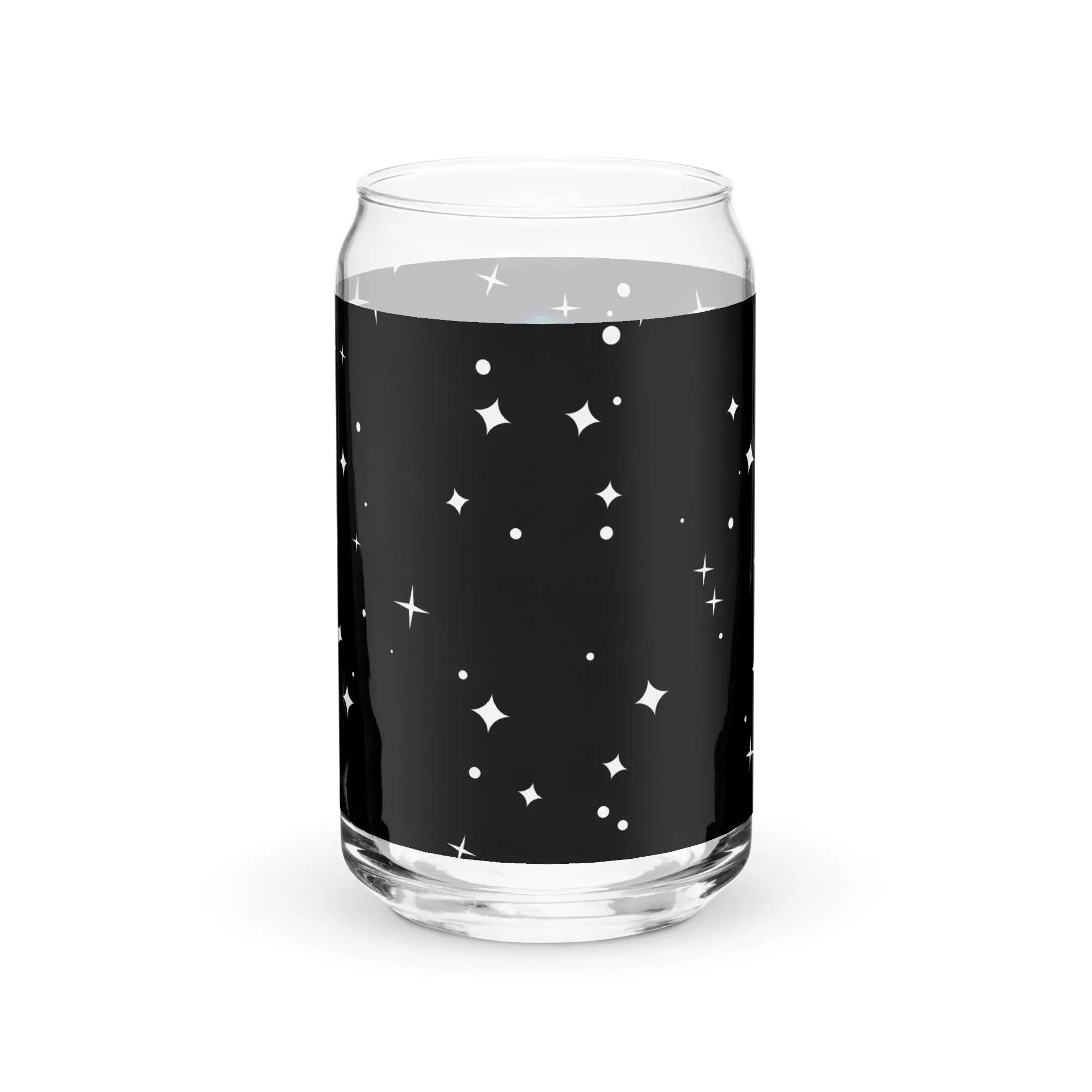 a glass filled with liquid with stars on it