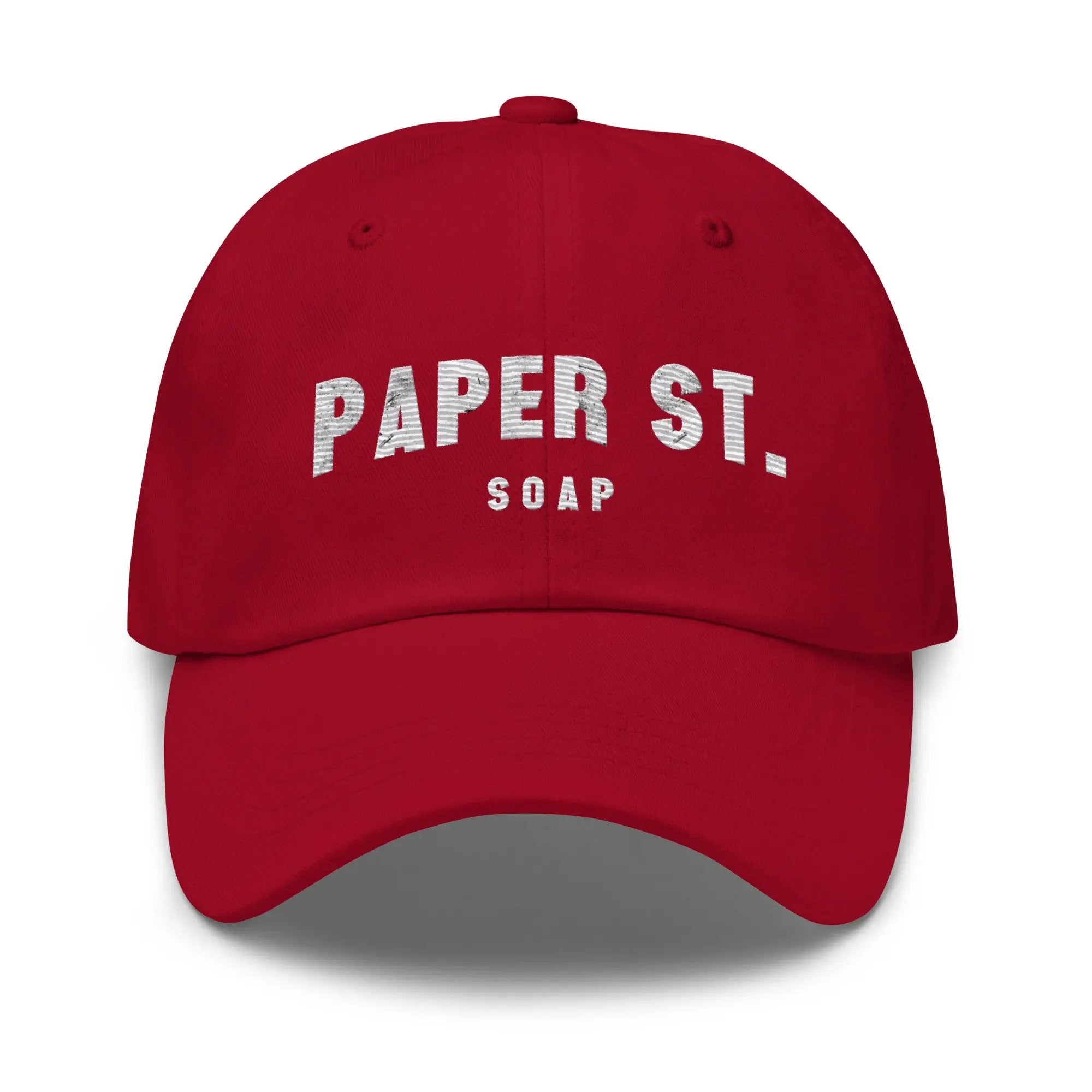 a red paper st soap cap on a white background