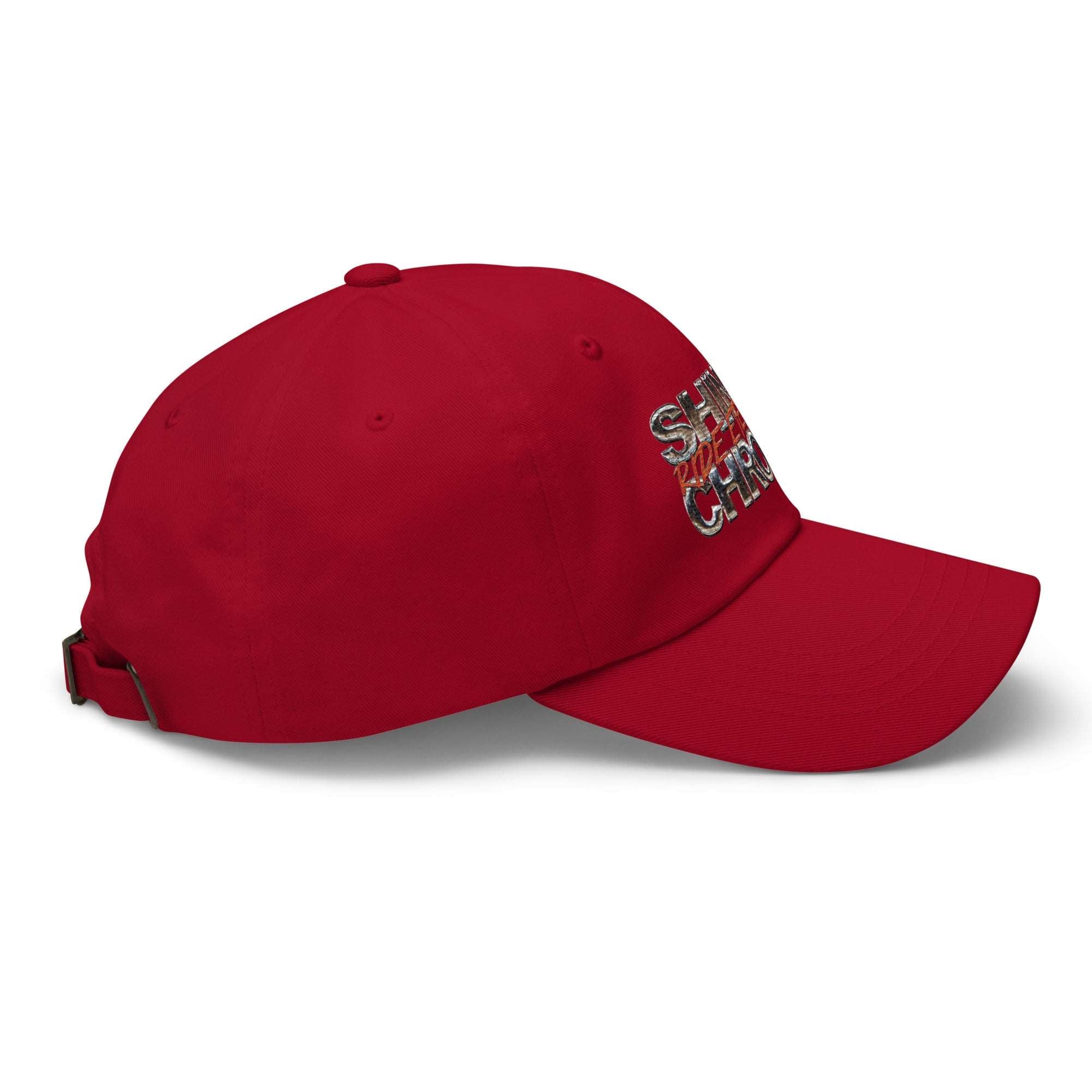 a red baseball cap with a patch on the side