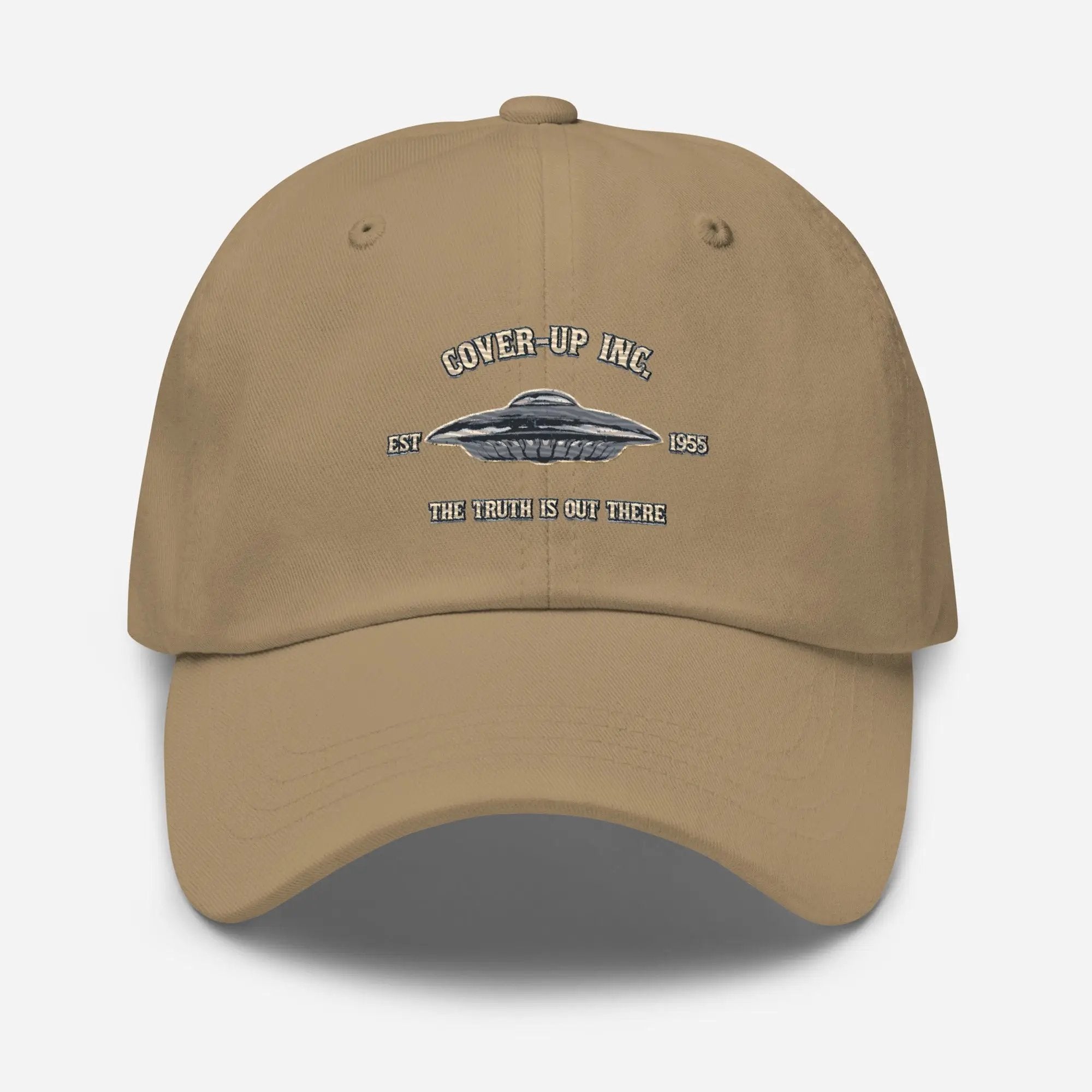 a tan hat with the words cover up inc on it
