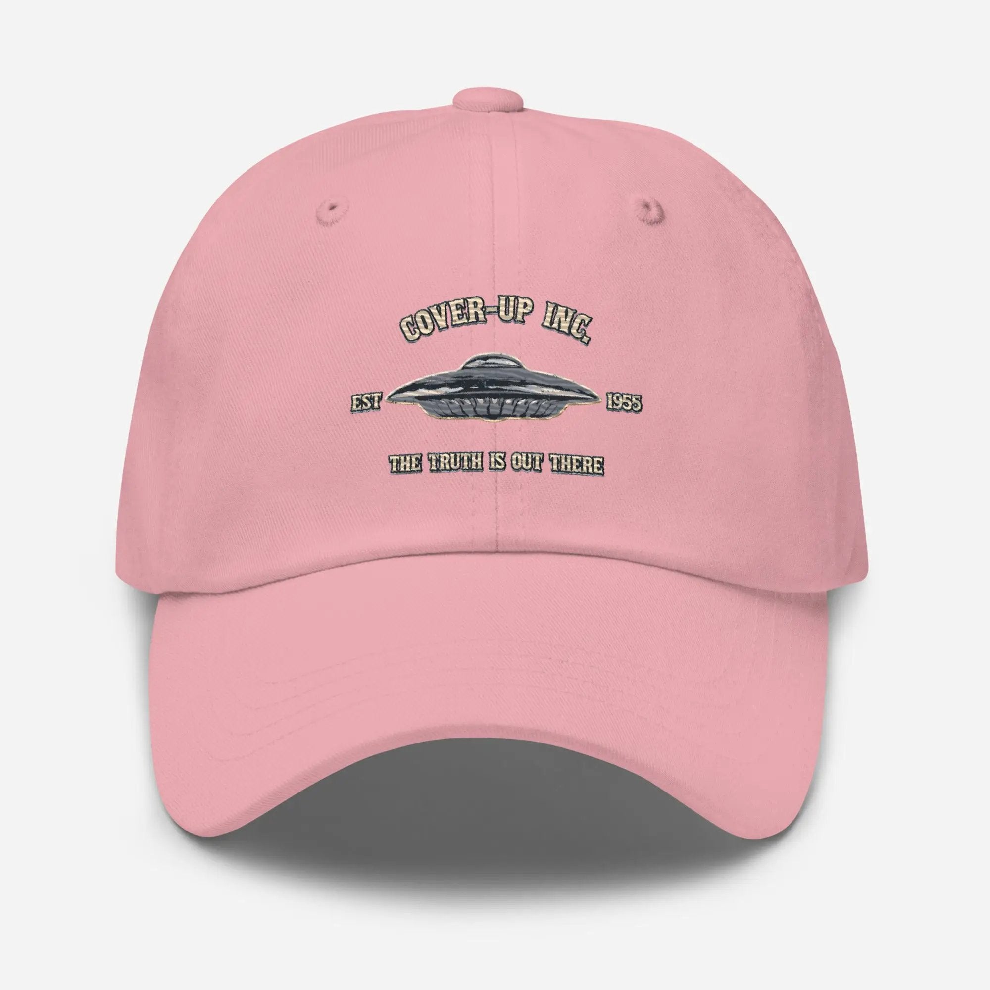 a pink hat with a picture of a flying saucer on it