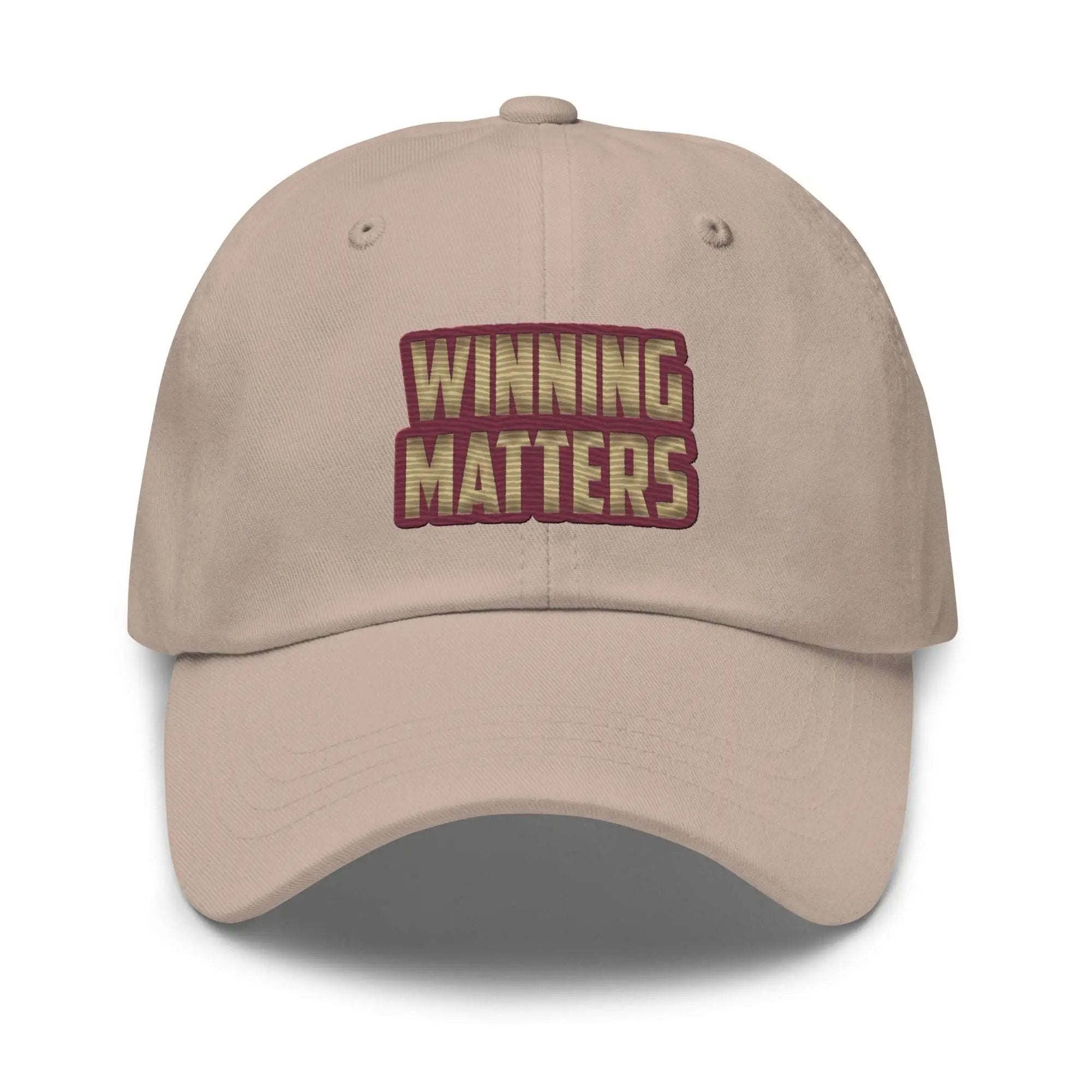 a baseball cap with the words winning matters printed on it