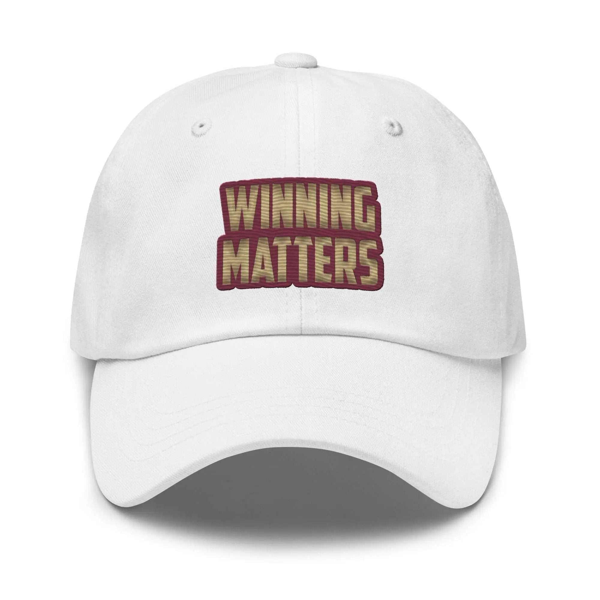 a white hat with the words winning matters printed on it