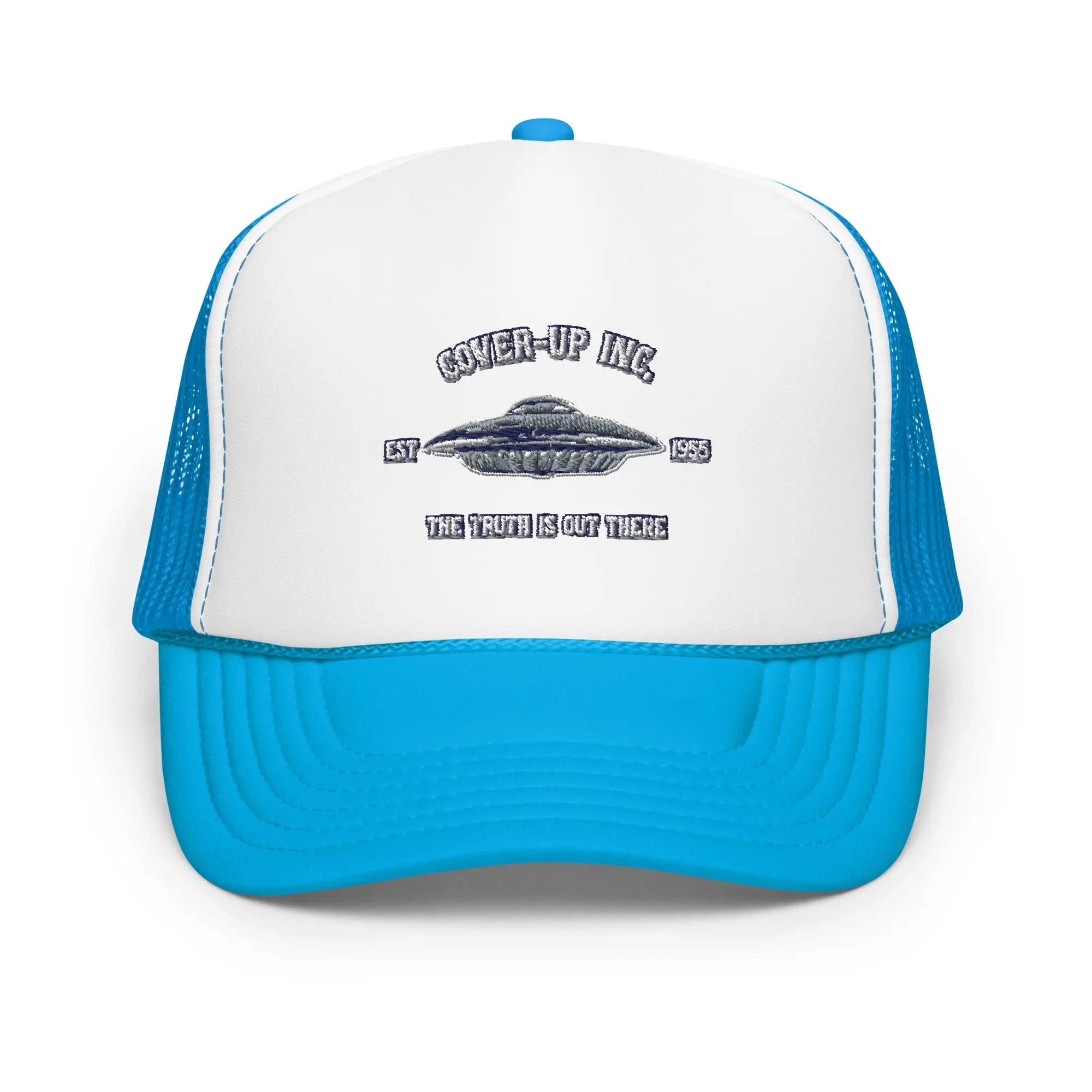 a white and blue trucker hat with a flying saucer on it
