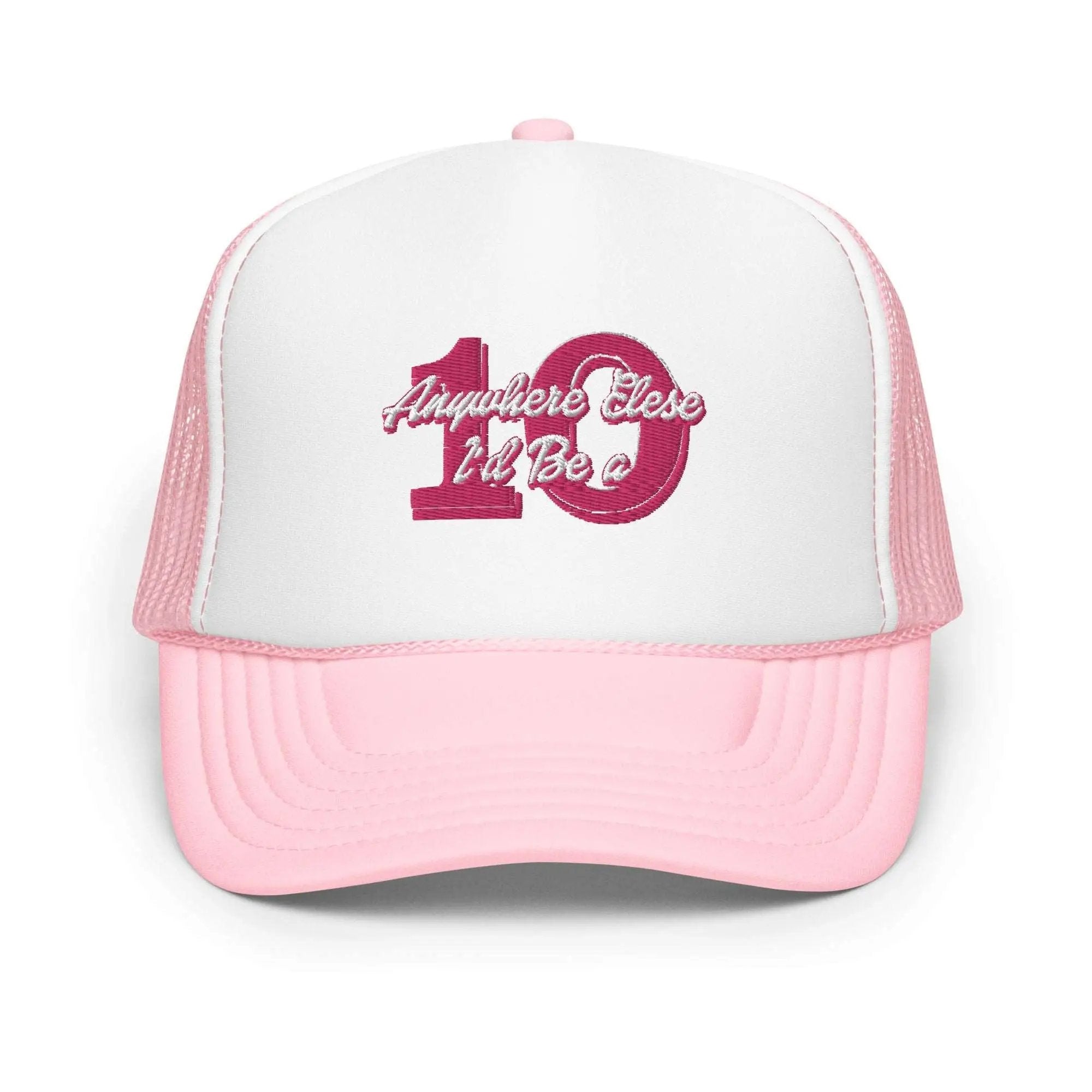 a pink and white trucker hat with the number one on it