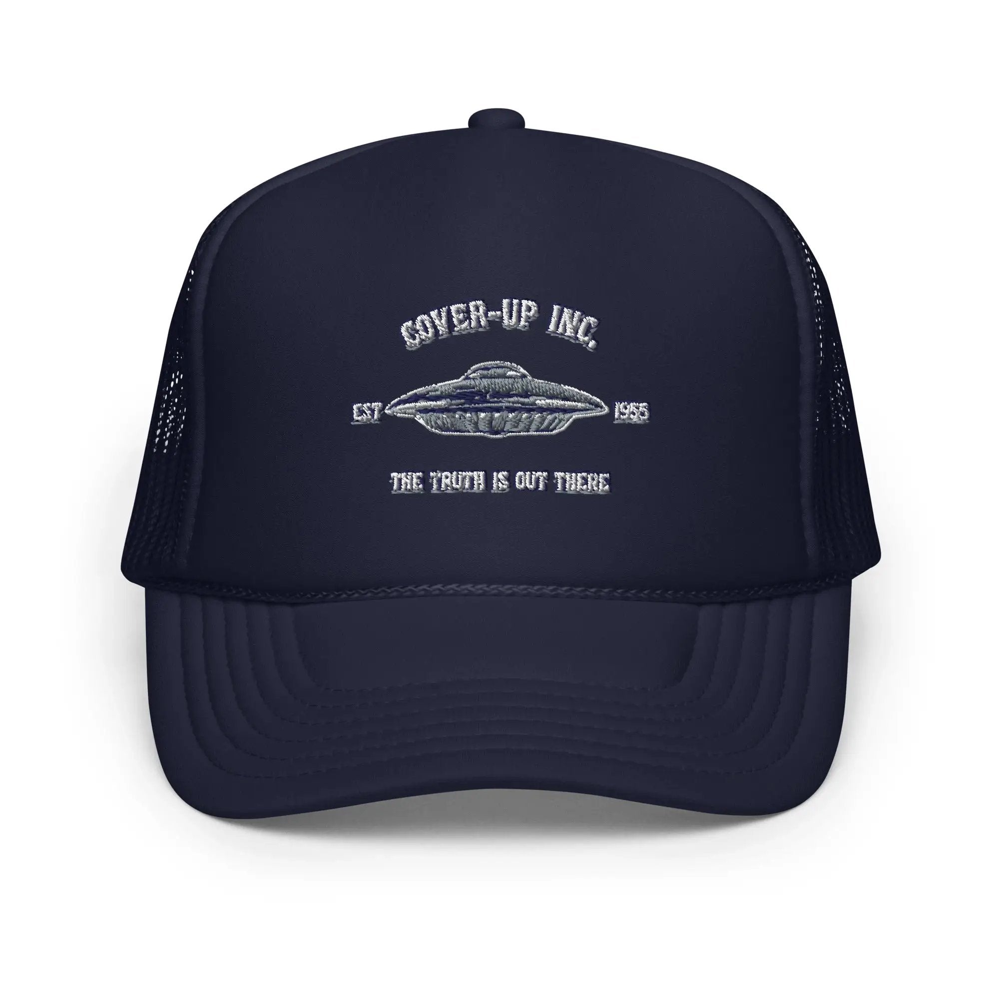 a navy trucker hat with an image of a flying saucer
