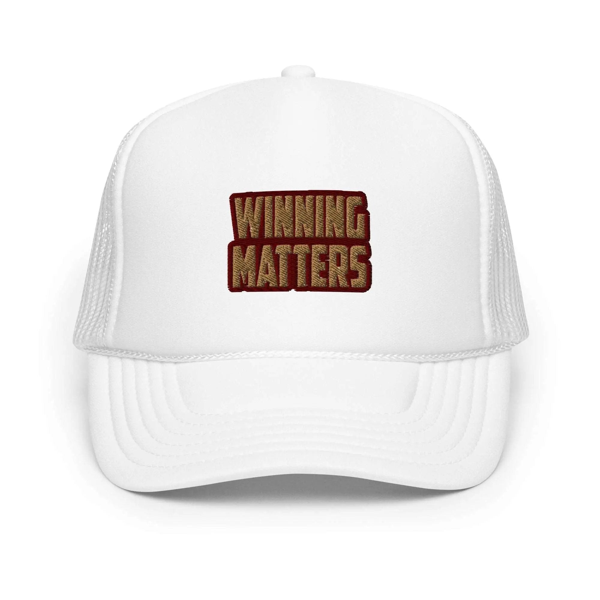 a white trucker hat with the words winning matters printed on it