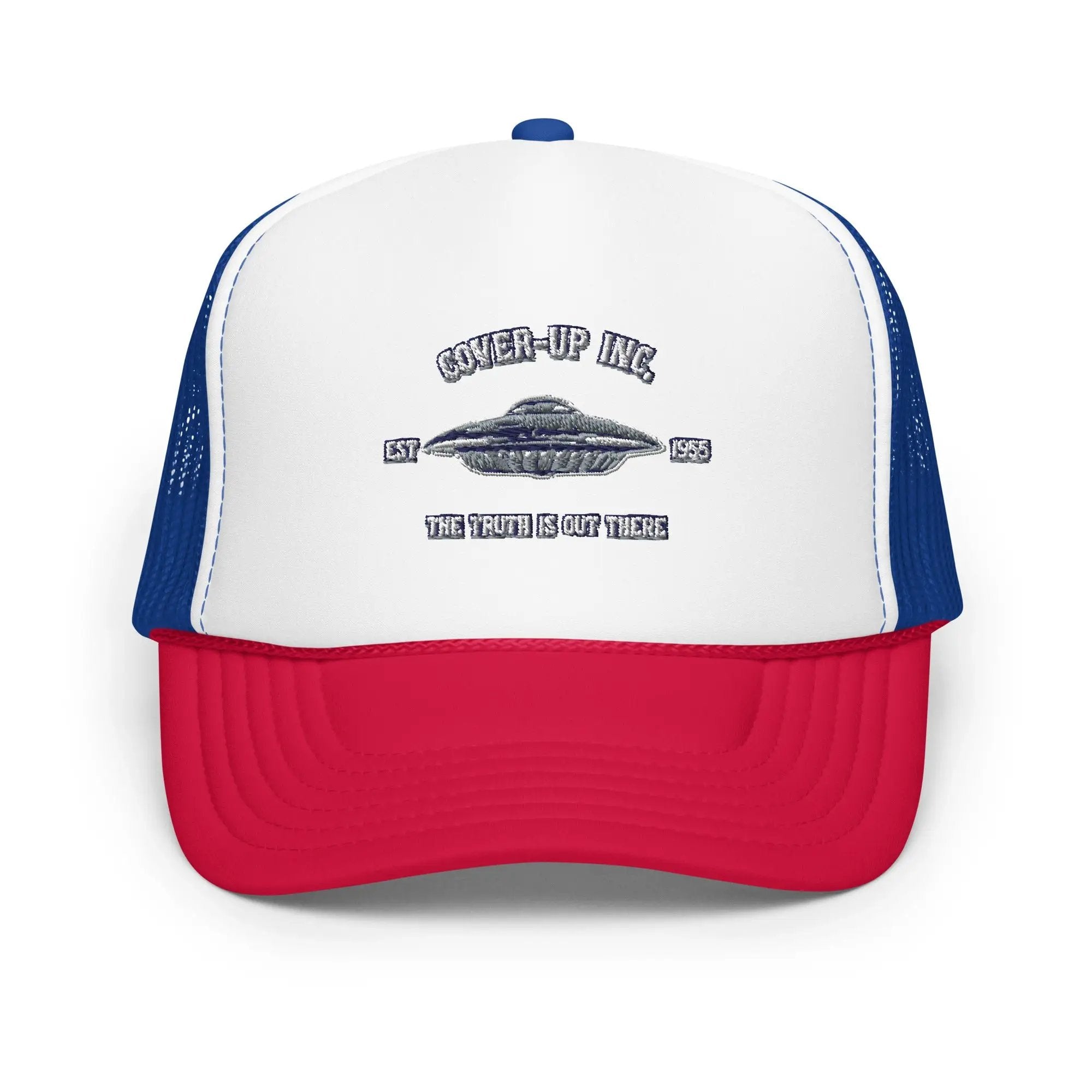 a red, white and blue trucker hat with a flying saucer on it