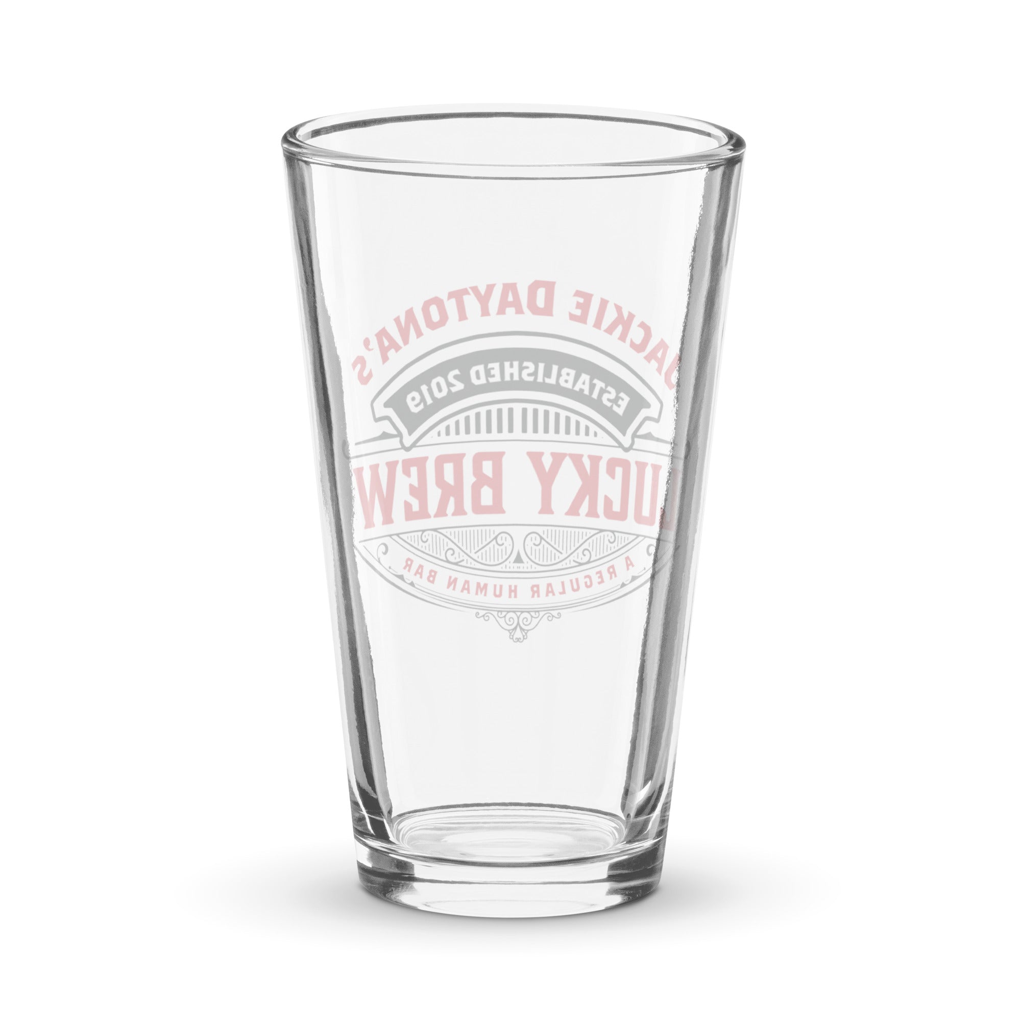 a shot glass with the words lucky brew on it