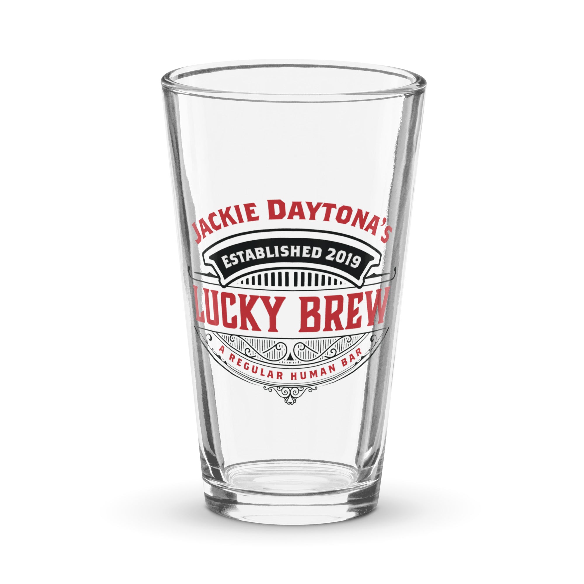 a shot glass with the name lucky brew on it