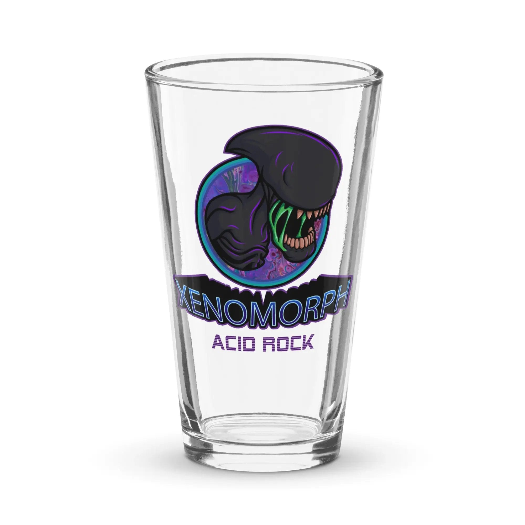 a shot glass with an image of a dinosaur on it