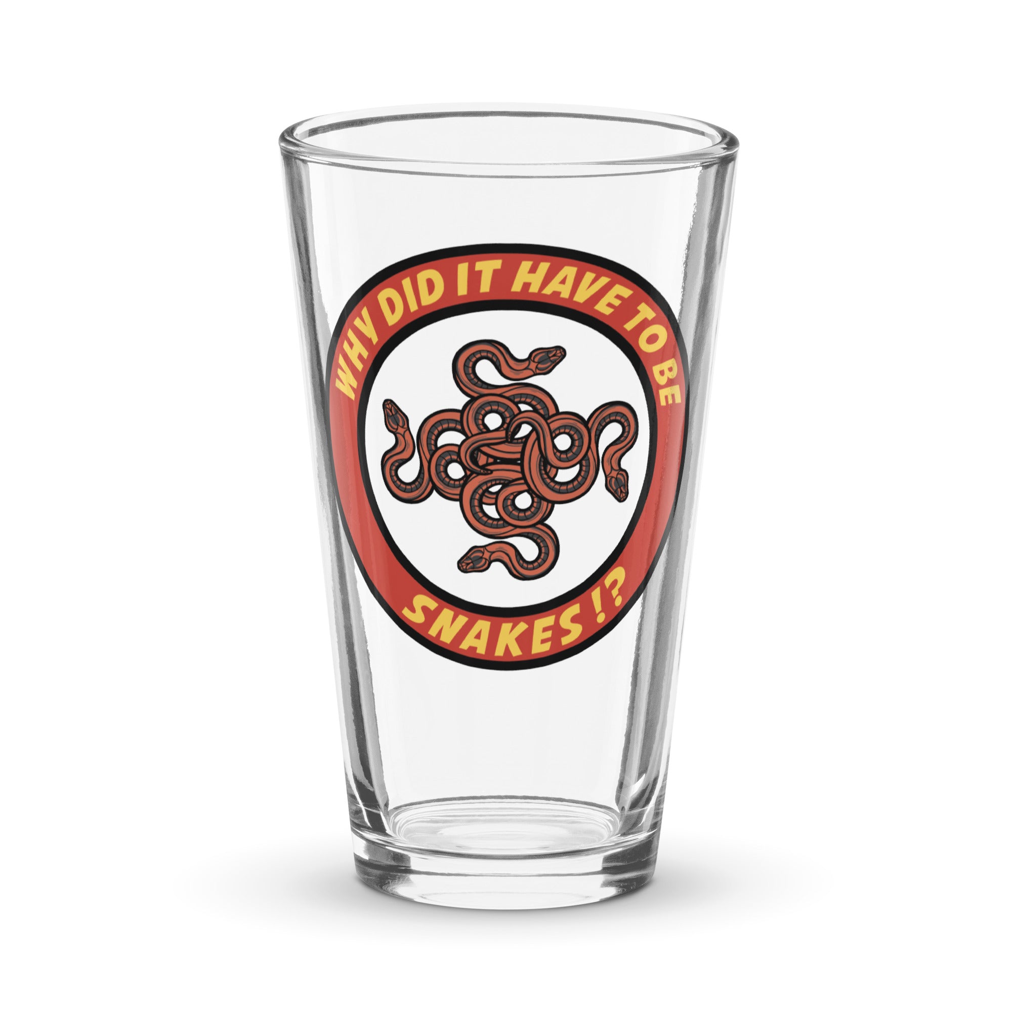 a shot glass with a snake on it