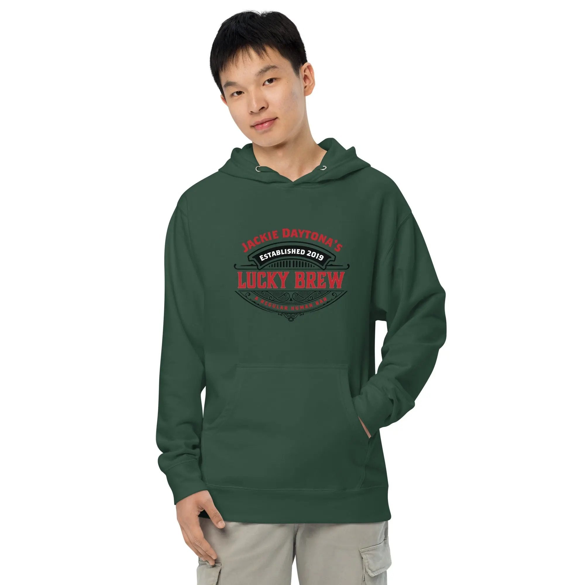a man wearing a green hoodie with the words lucky brew on it