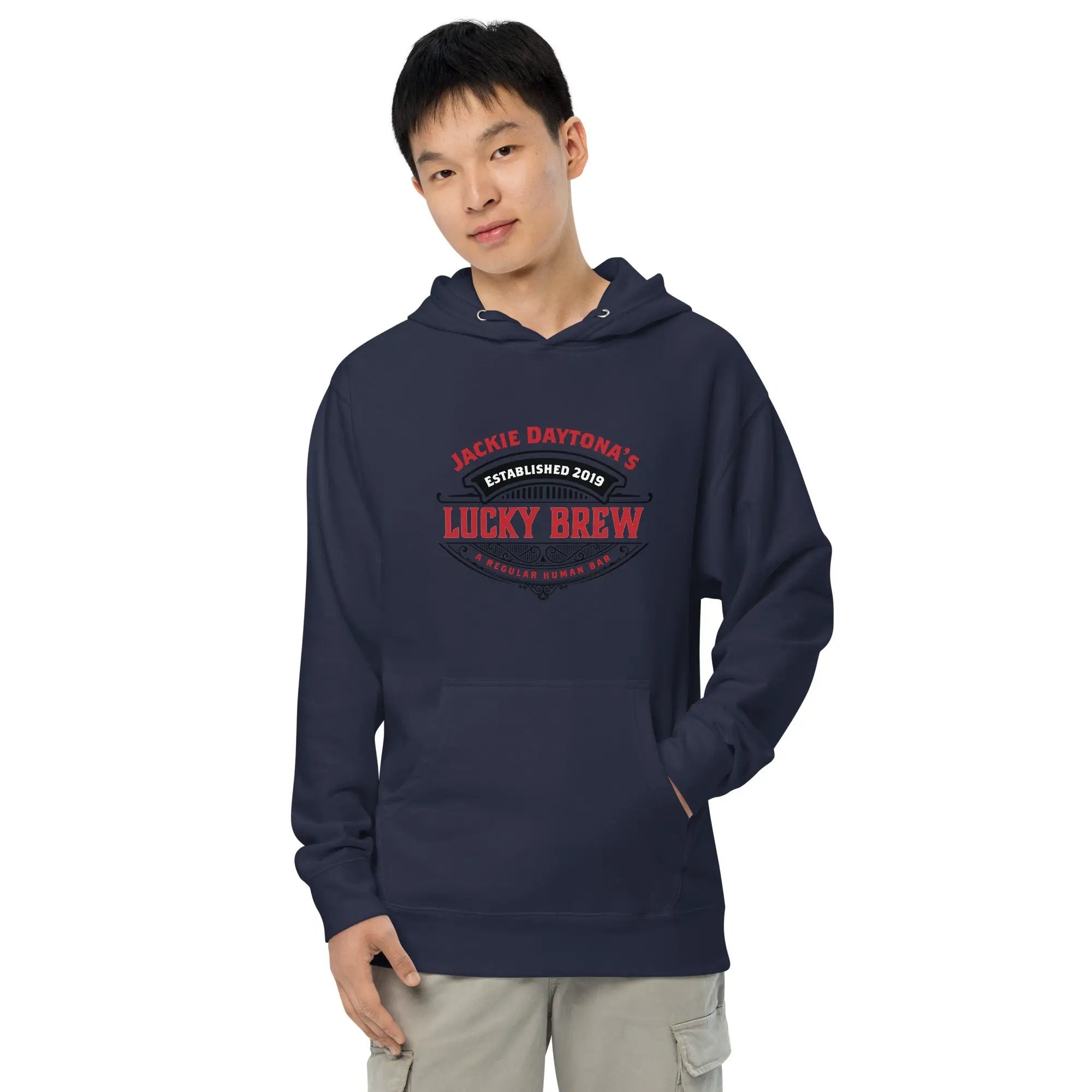 a man wearing a blue hoodie with a lucky brew on it